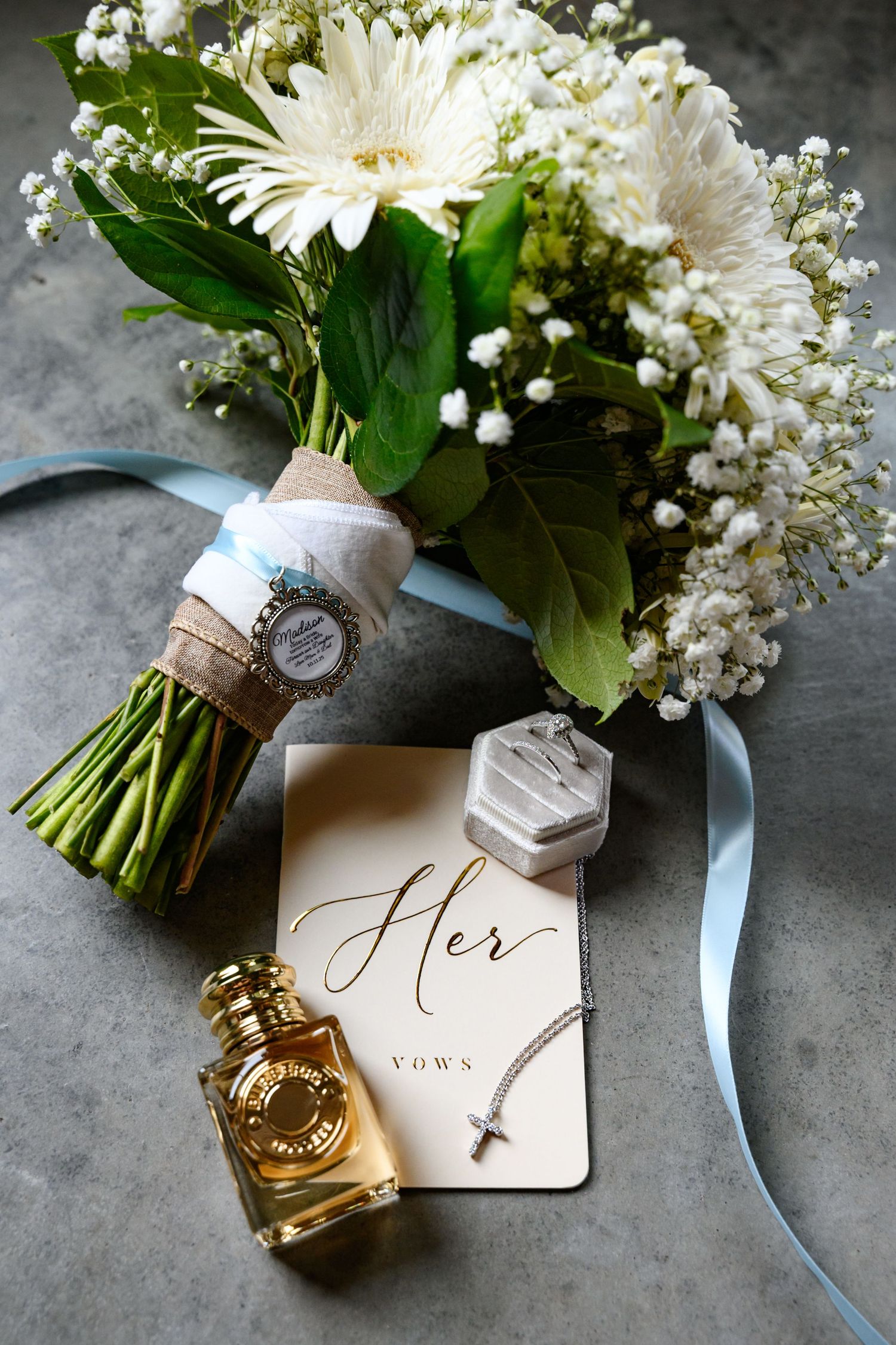 Detailed wedding flat lay from a wedding at Camp 400 in McCune, KS.