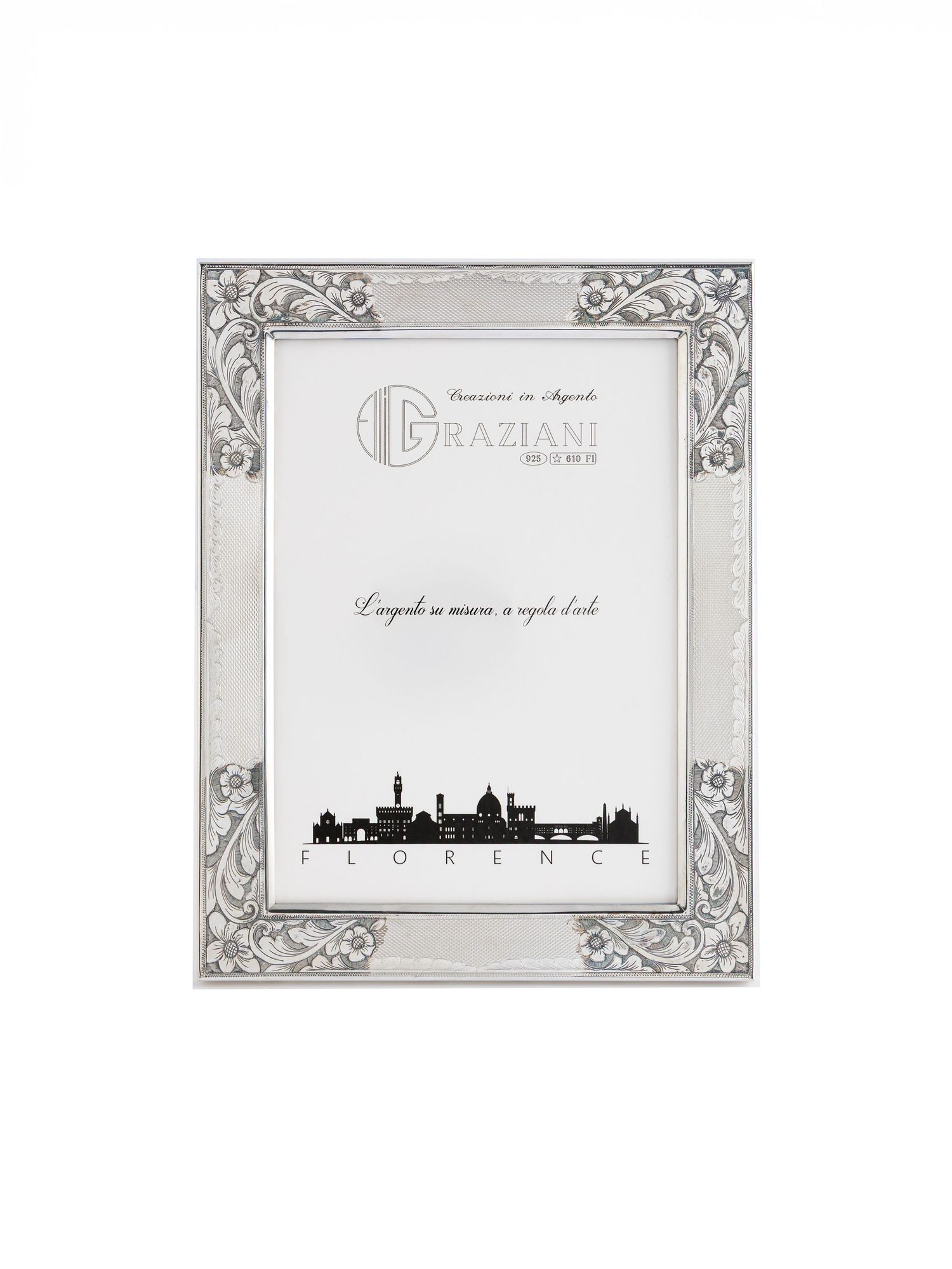 Elegant silver photo frame with ornate floral corner designs and city skyline silhouette at bottom.