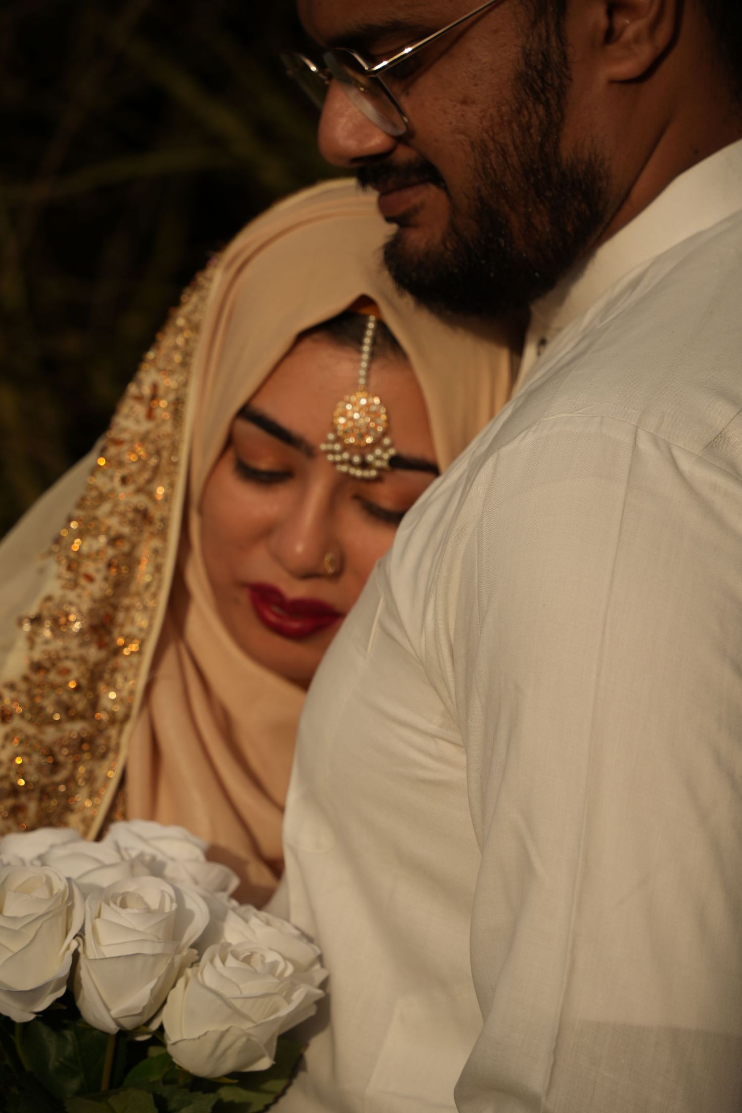 bride and groom head on chest. Tied in Time Photography.