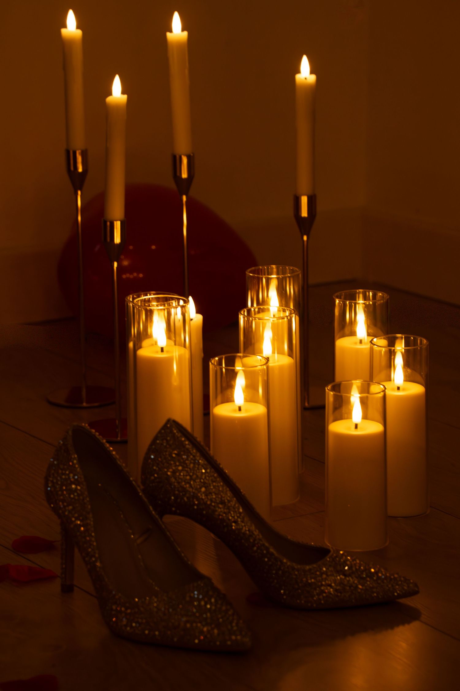 detail shot of heels roses candles and rose petals. Tied in Time Photography.