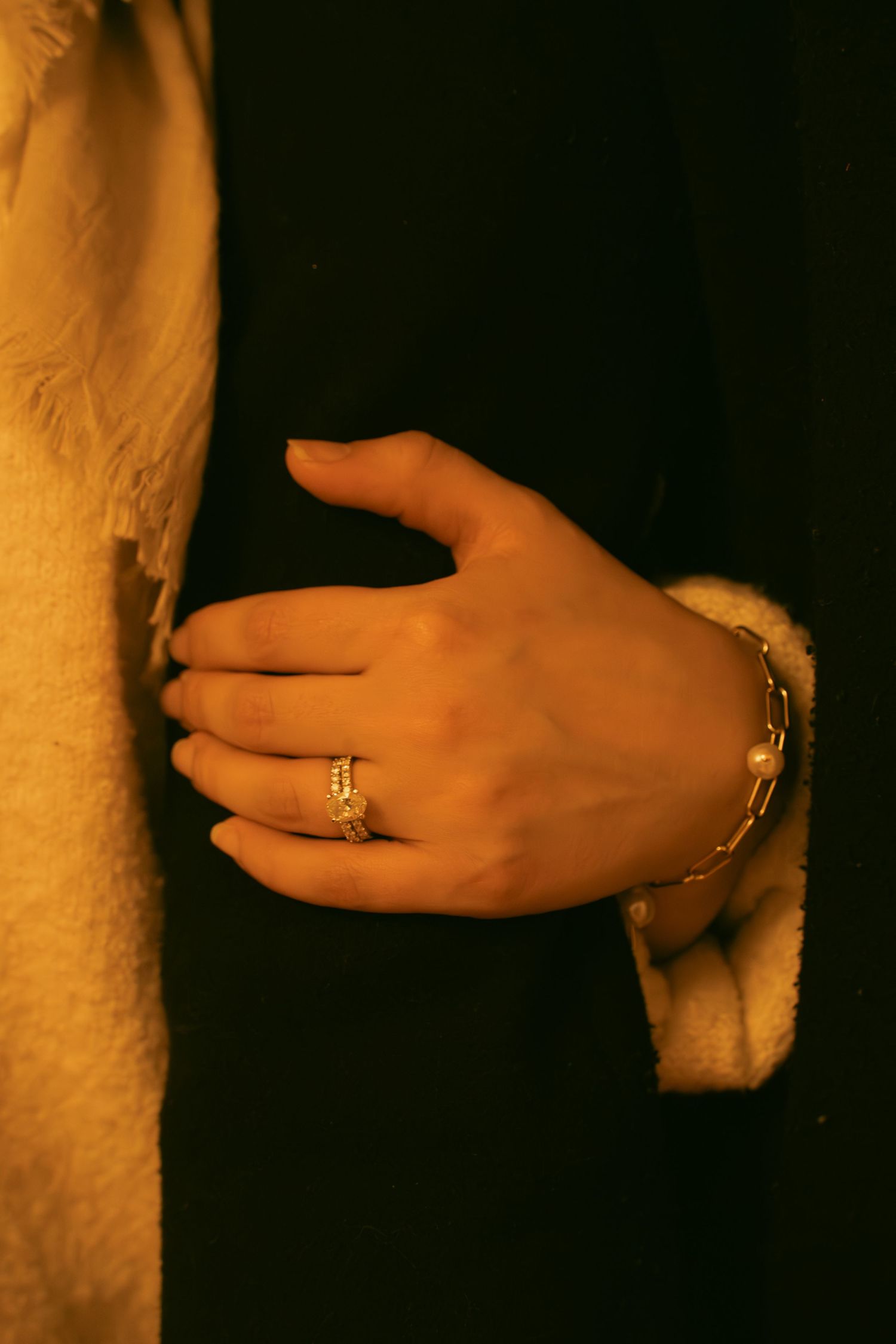 ring focus, bride holding groom's arms. Tied in Time Photography.