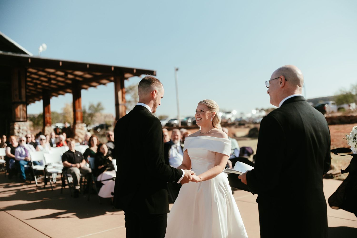 Wedding ceremony sequence showing outdoor celebration moments under bright sunlight.