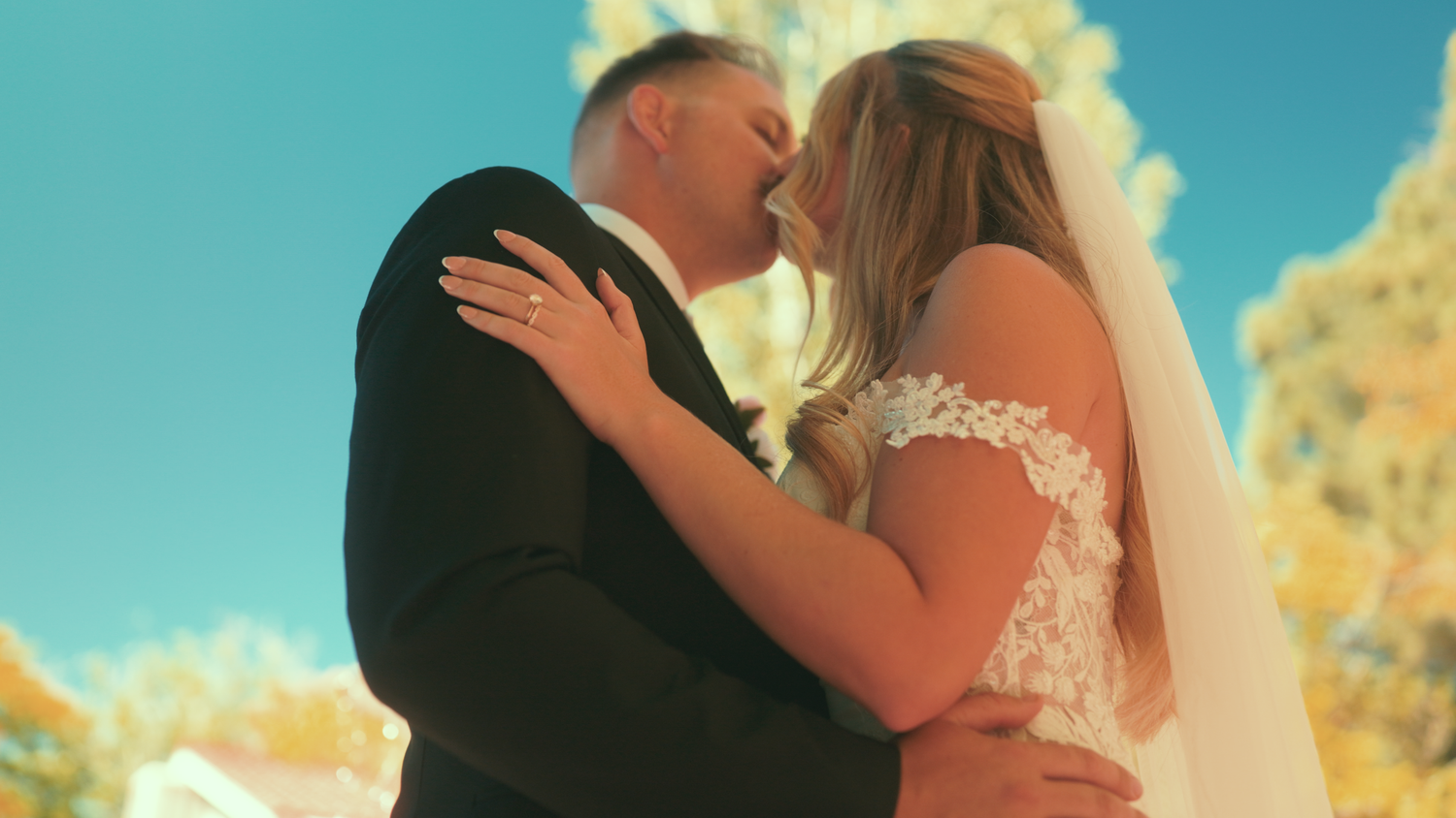 Romantic wedding sequence capturing intimate moments between a couple in golden sunlight.