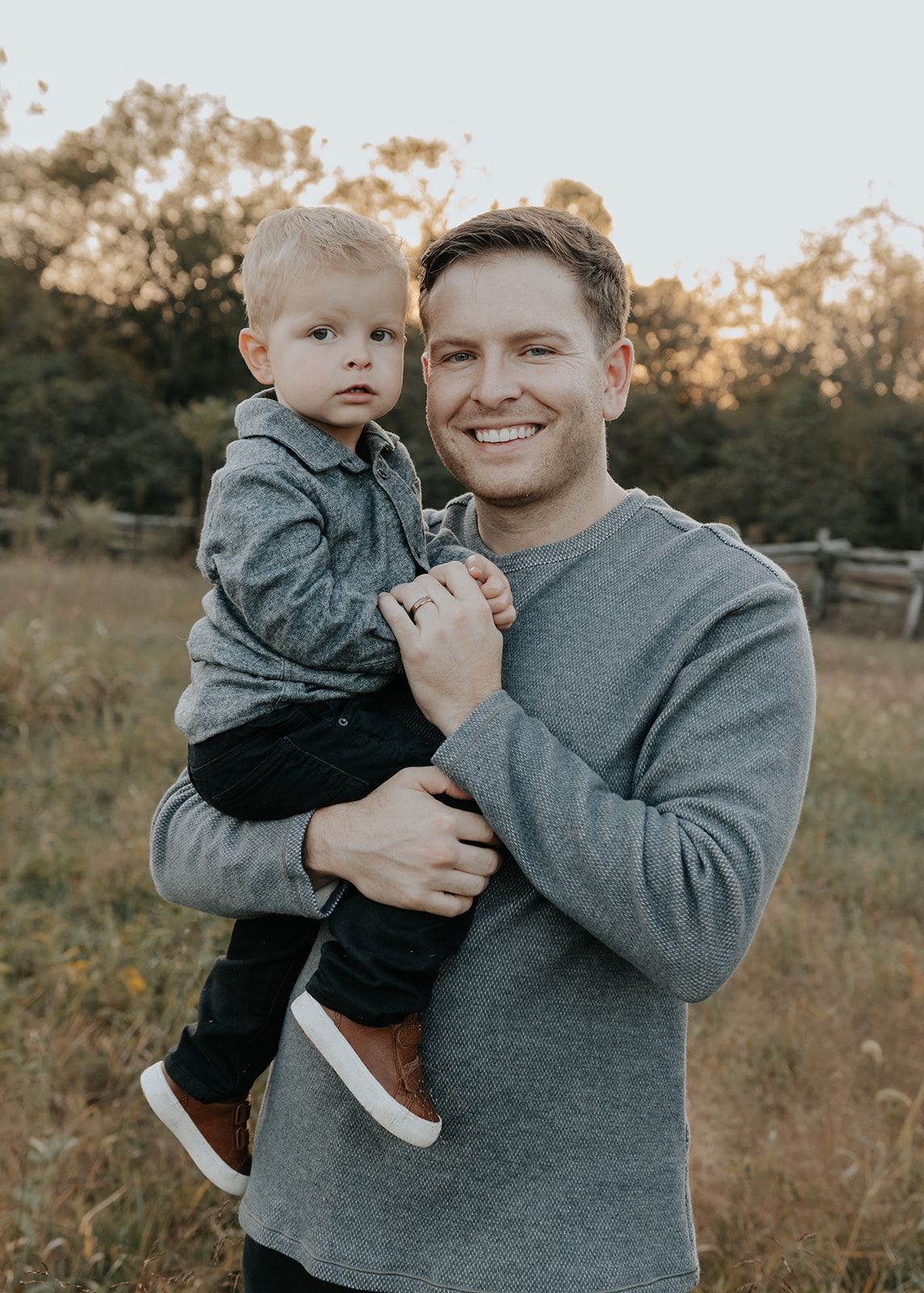 Father and son candid moment during family photoshoot in Republic, Missouri