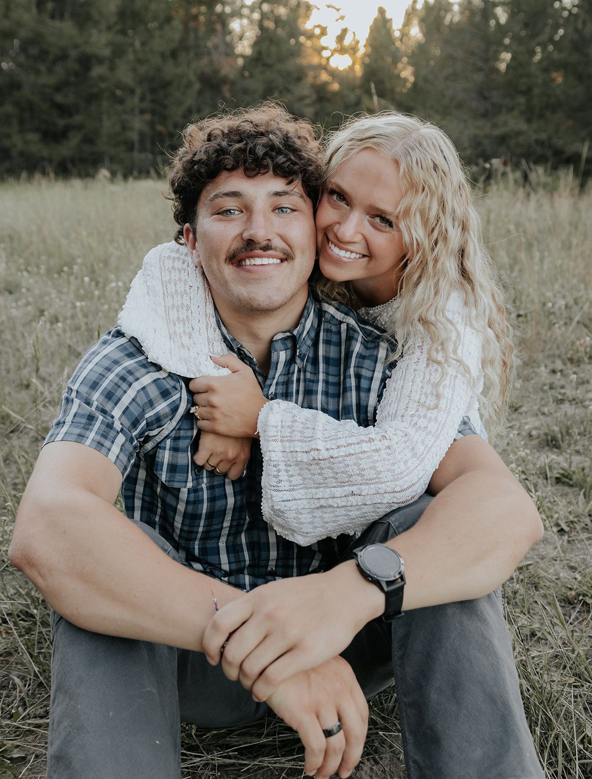 Couples engagement session in Island Park, Idaho during the summer. Wedding announcement photo