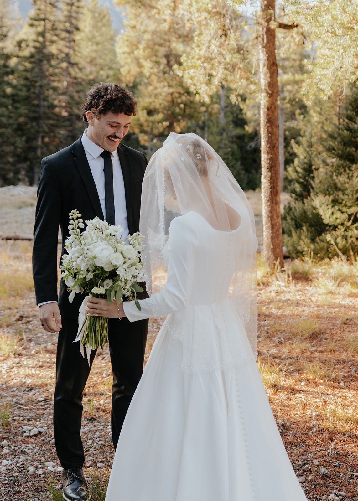 First look in Grand Teton National Park, mountain bridal photos