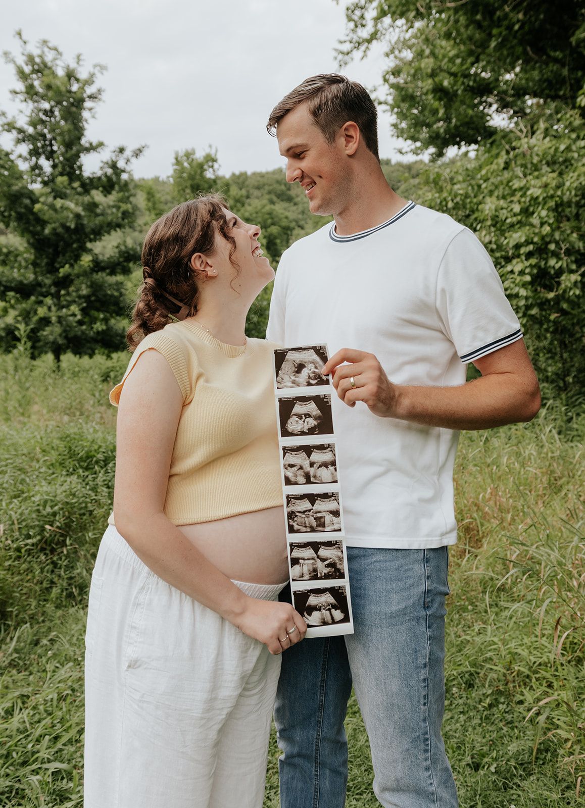 Maternity photos and pregnancy announcement taken in St Louis Missouri in the summer