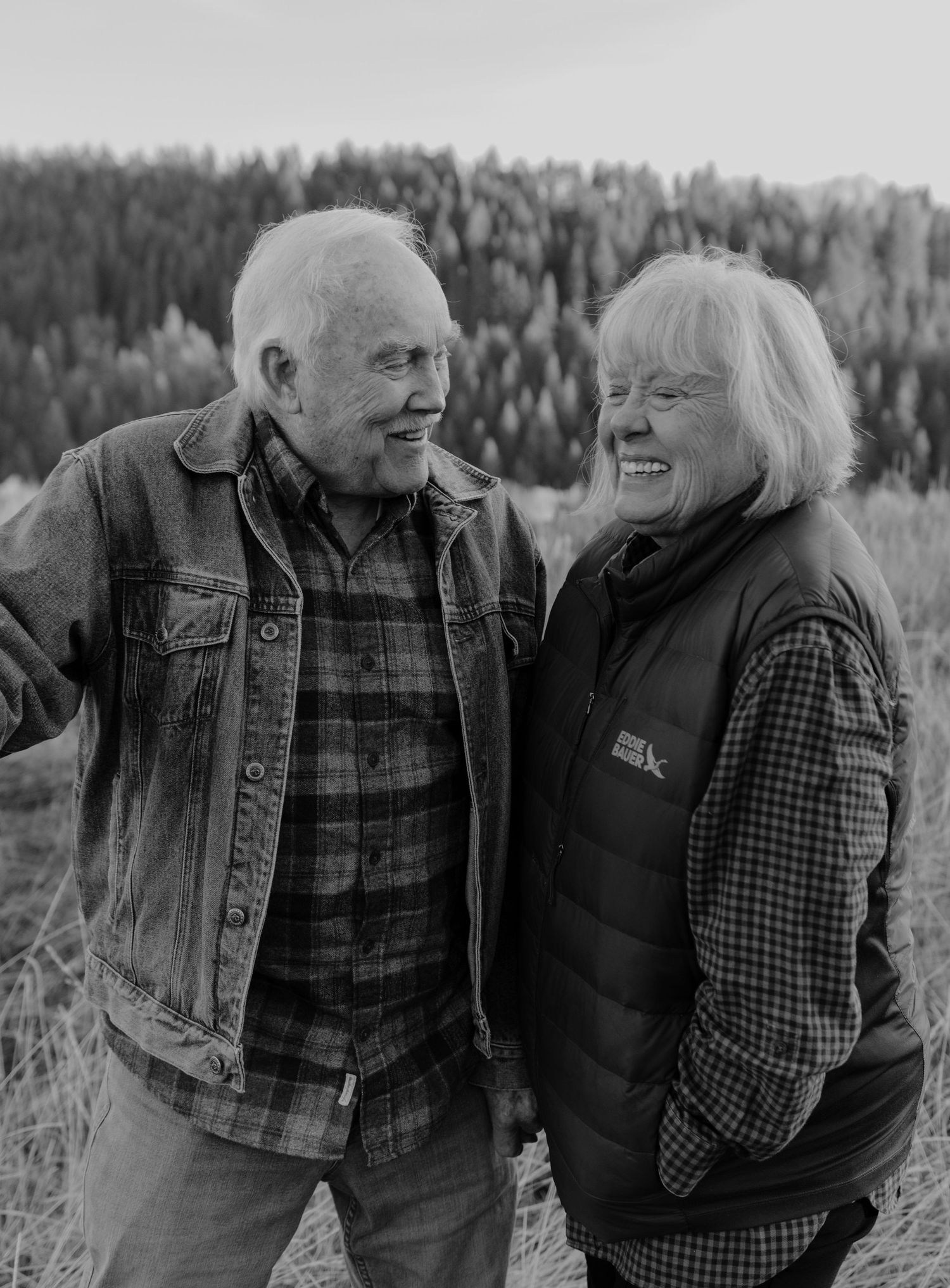 Photo of elderly couple laughing near Warm River, Idaho