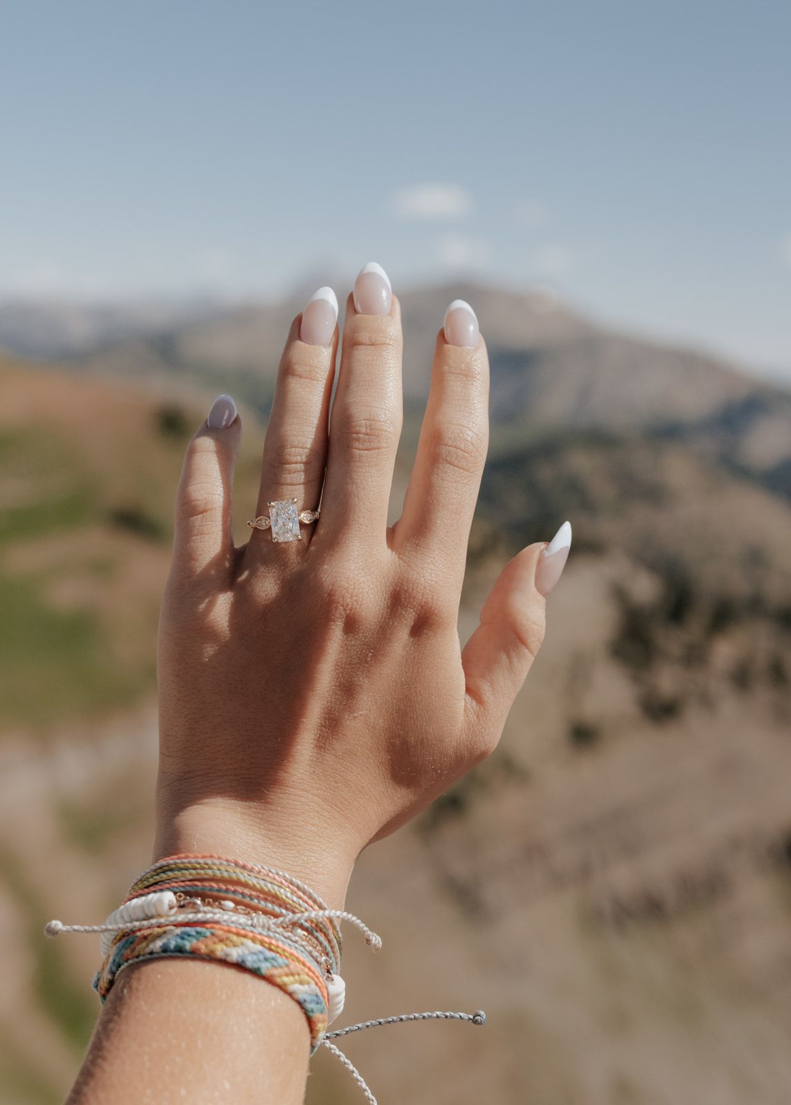 Detail shot of engagement ring after a surprise mountain-top proposal in Jackson, Wyoming