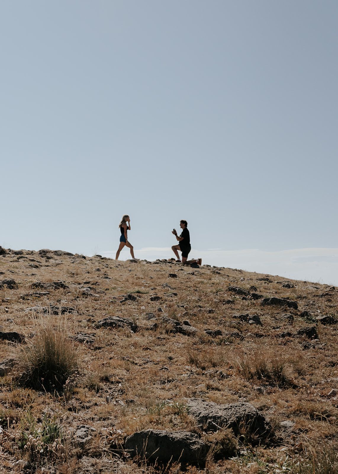 Surprise proposal on a hike in Jackson, Wyoming near the Tetons in August