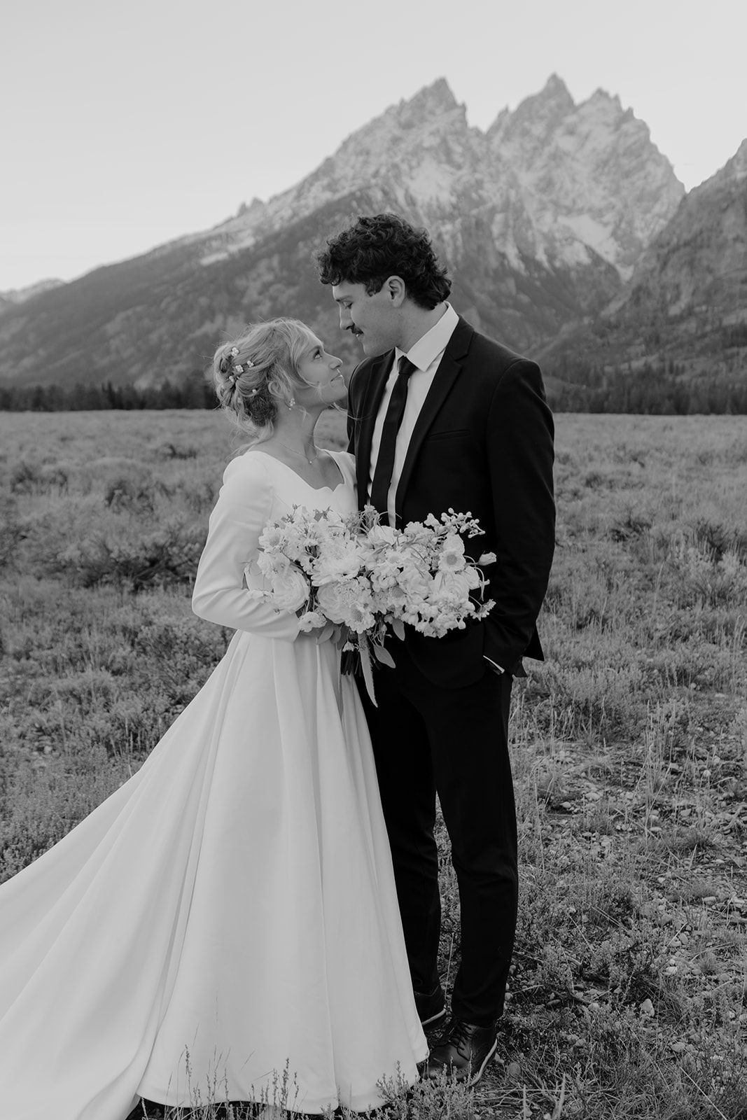 Candid bridal photoshoot in Grand Teton National Park, mountain elopement, black and white bridal photo
