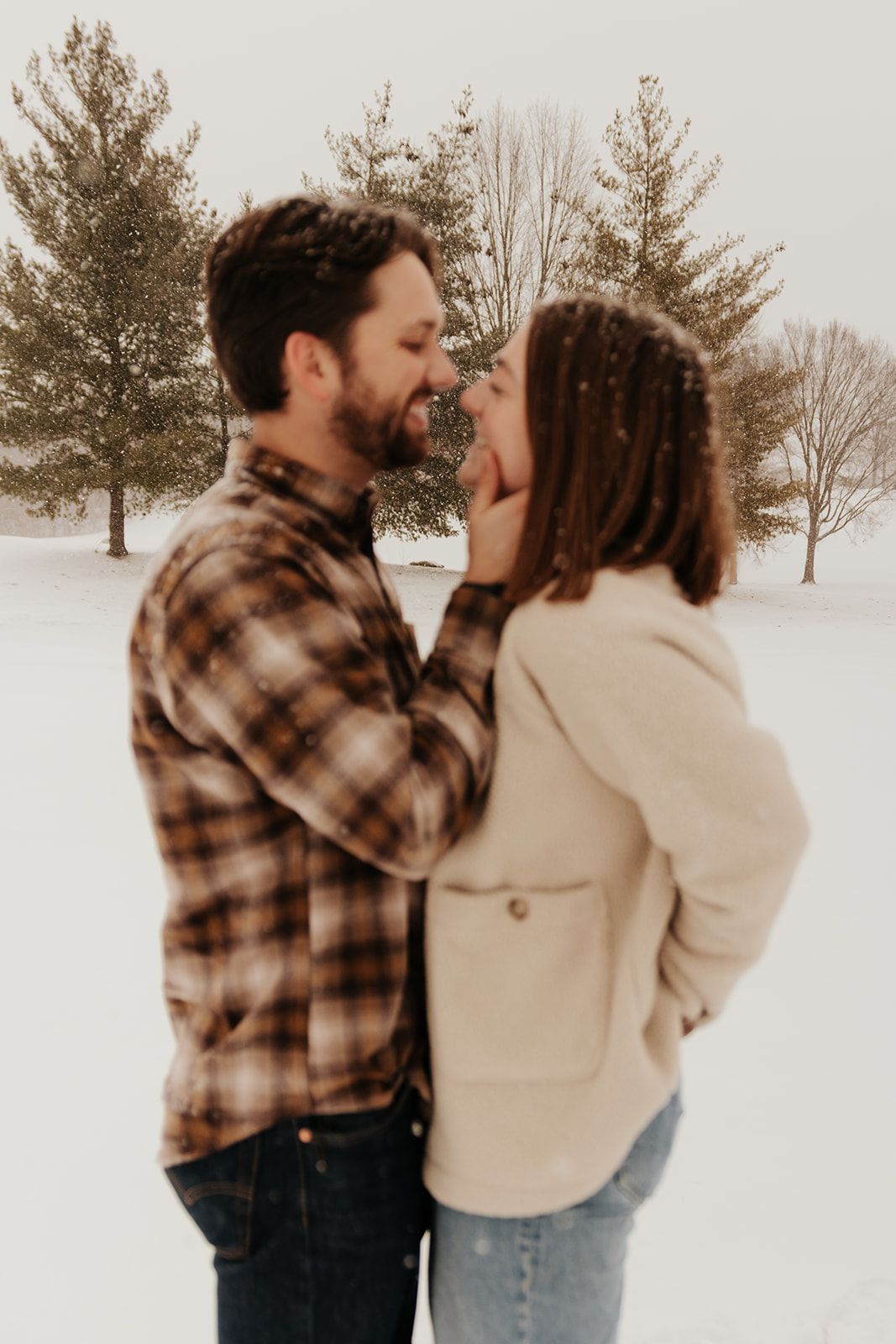 Snowy photoshoot of couple in republic, Missouri