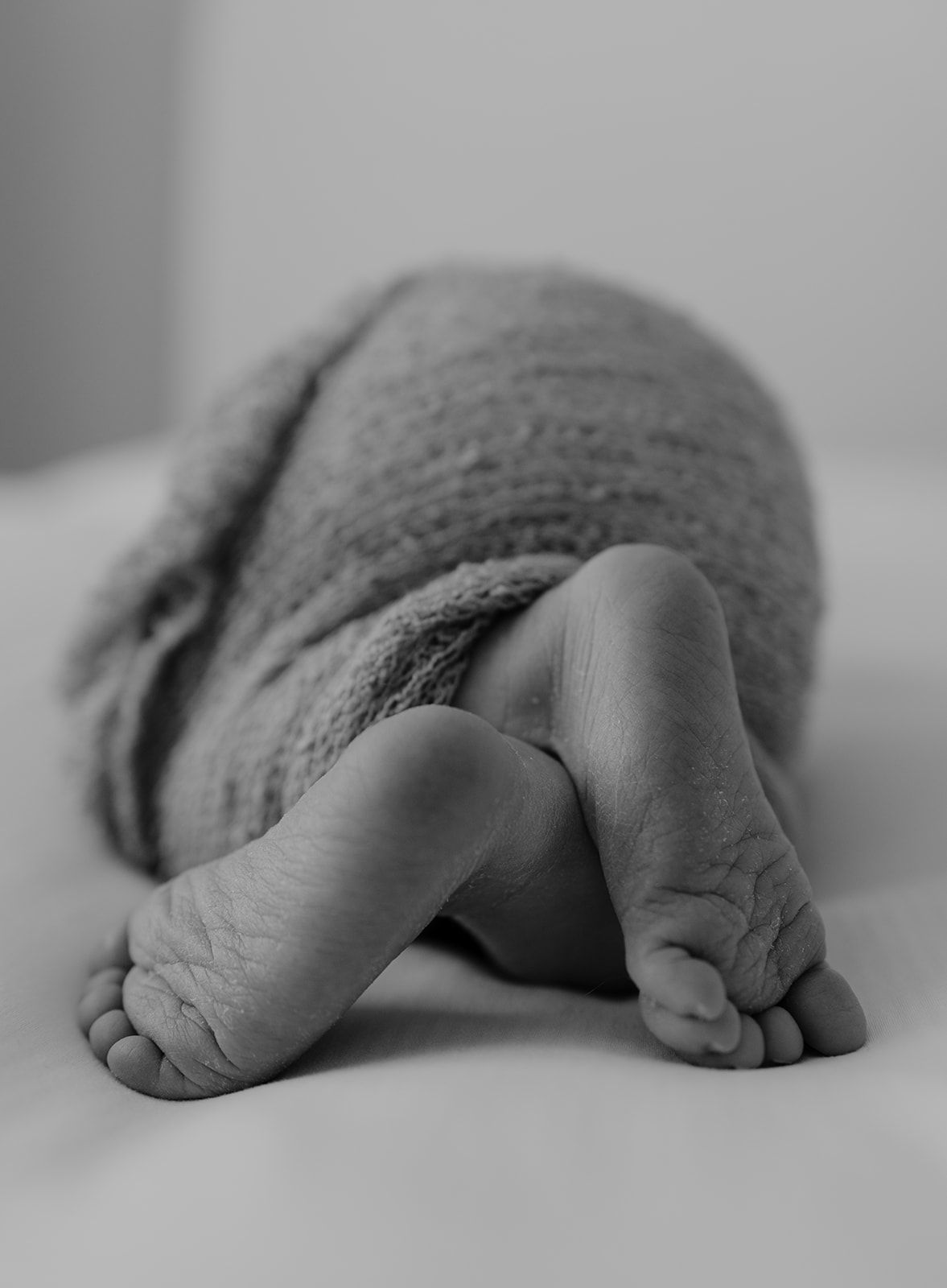 Black and white newborn feet