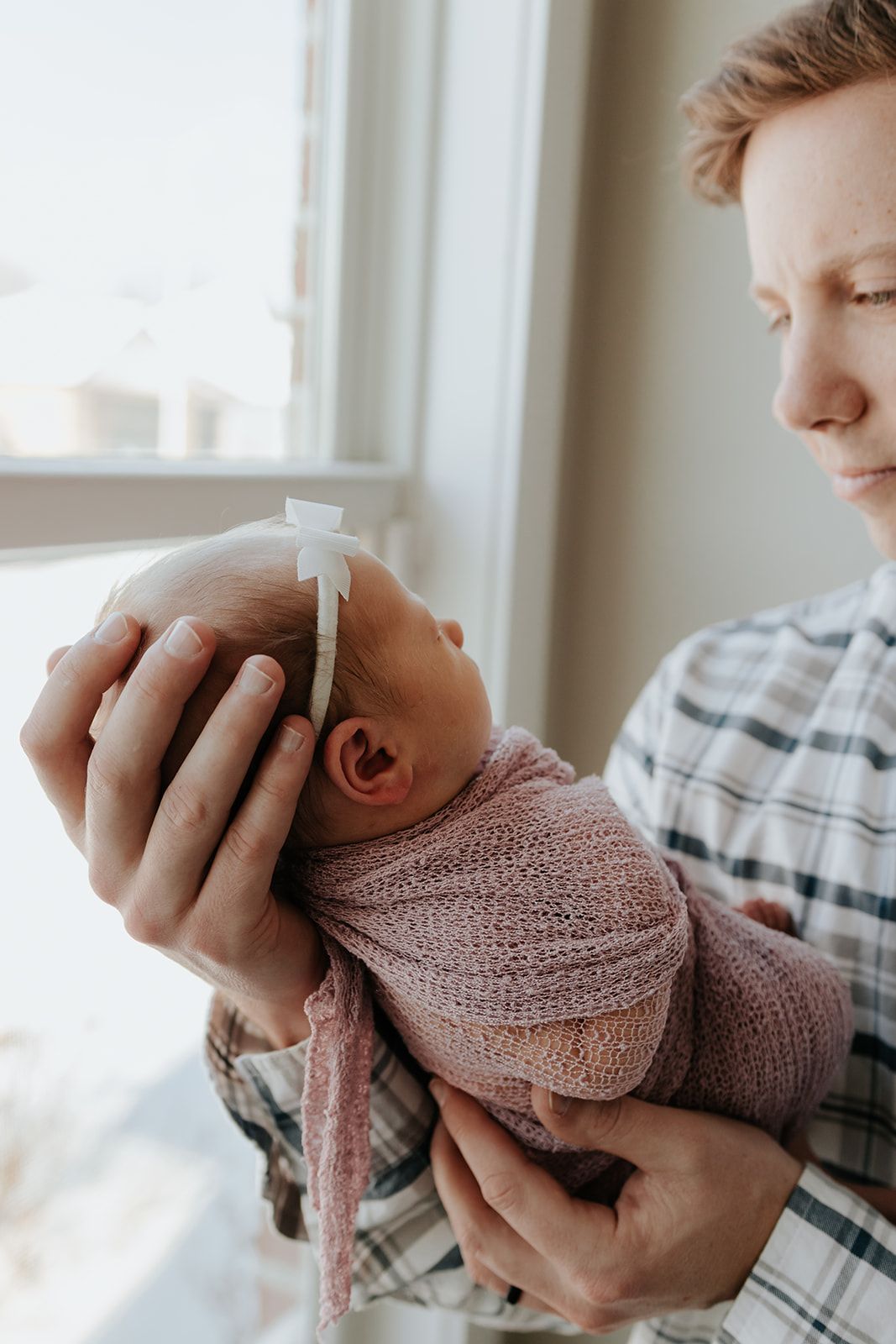 Father and newborn baby, in-home newborn session in Springfield, Missouri