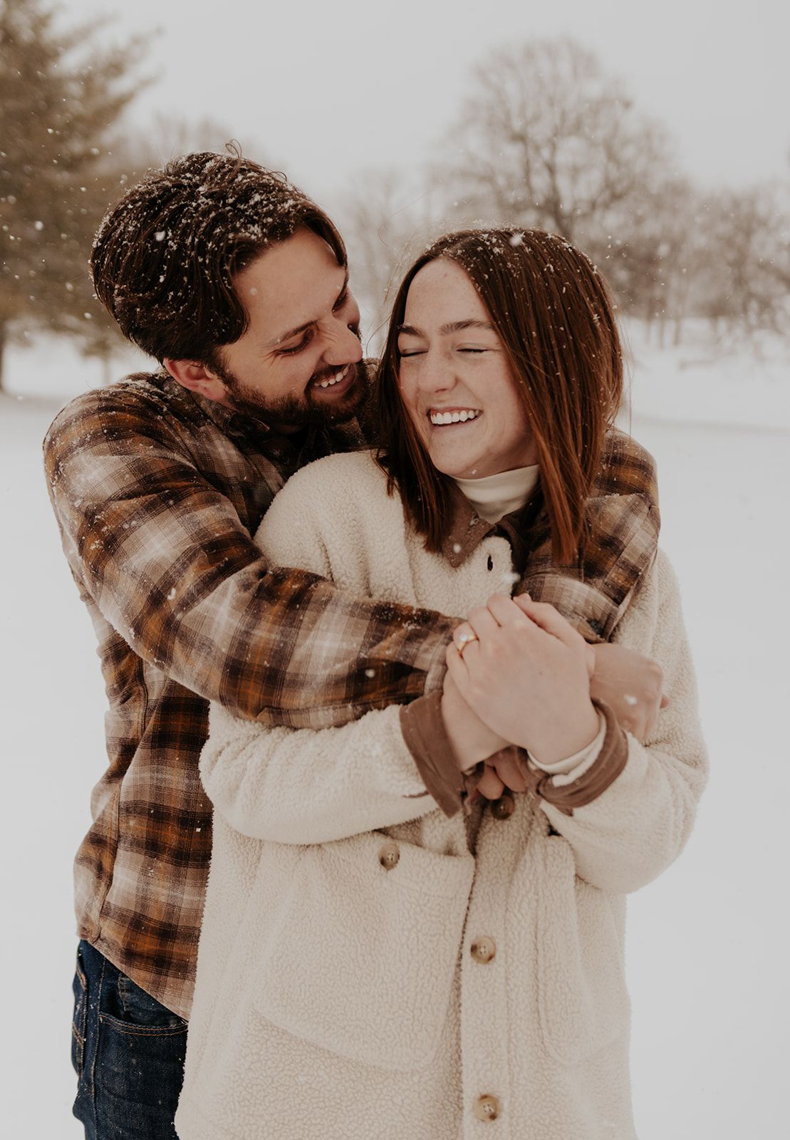 Snowy photoshoot of couple in Springfield, Missouri