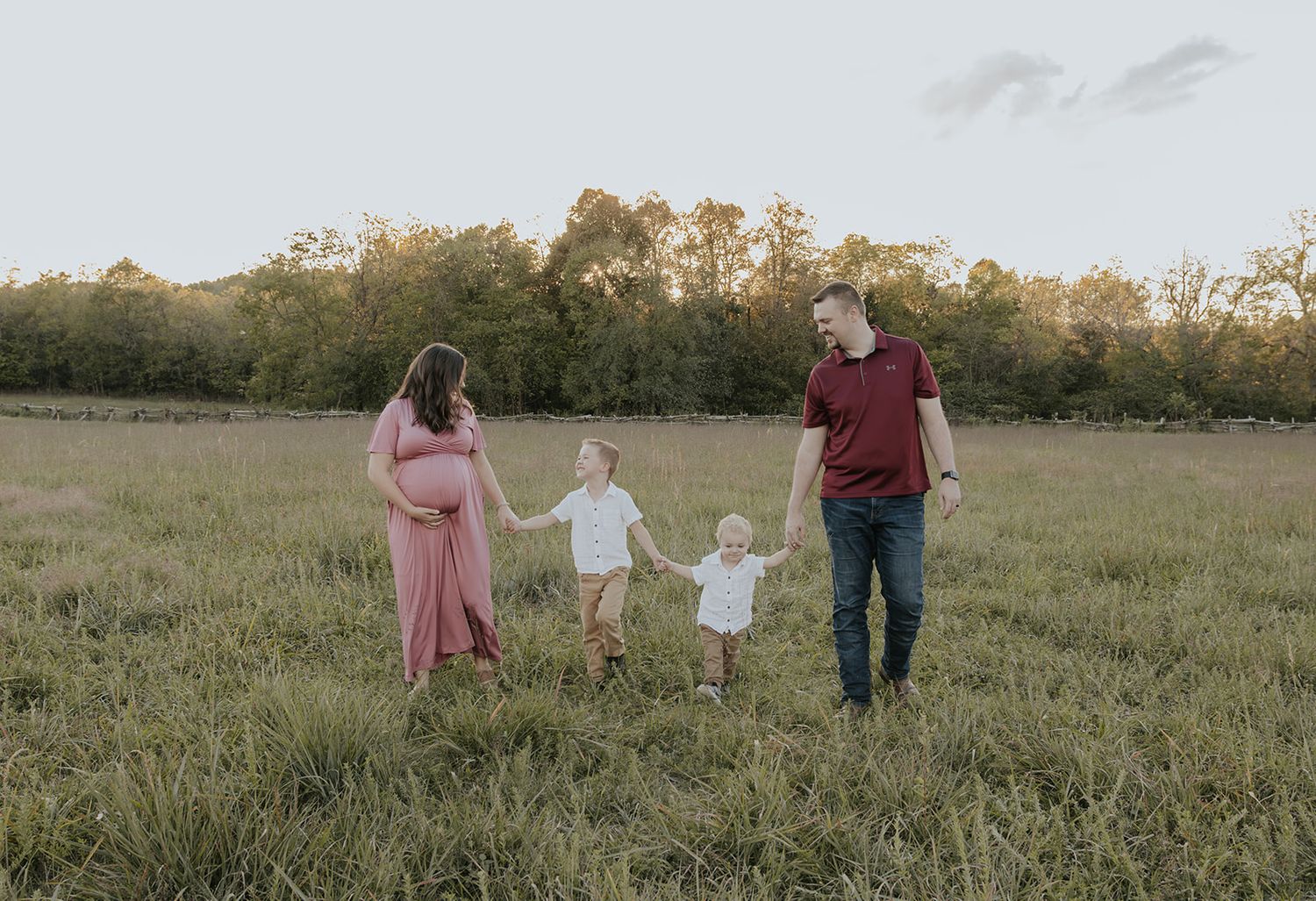 Small family photoshoot at Wilson's Creek National Battlefield in Springfield, Missouri. Walking in field