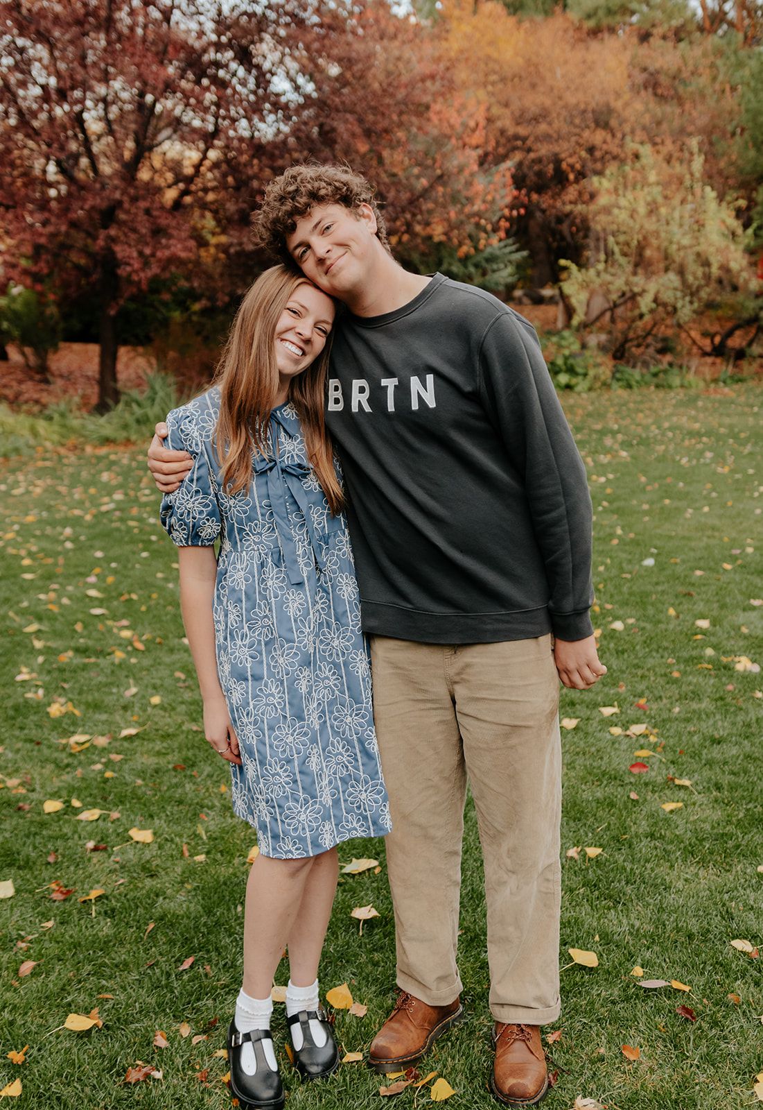 Photo of brother and sister during a family photoshoot in Rexburg, Idaho at the BYU-Idaho gardens