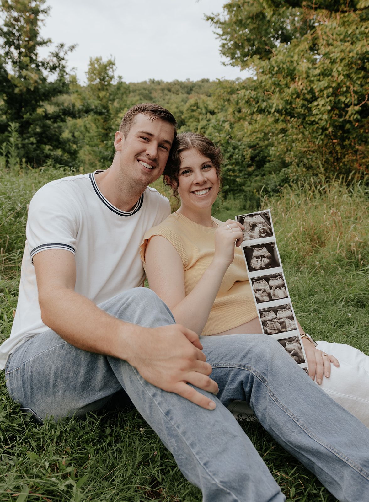 Maternity photos and pregnancy announcement taken in St Louis Missouri in the summer