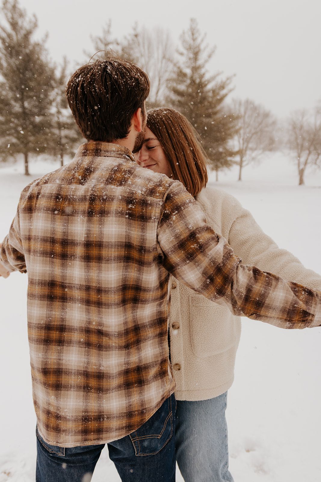 Engagement session, kiss on the forehead