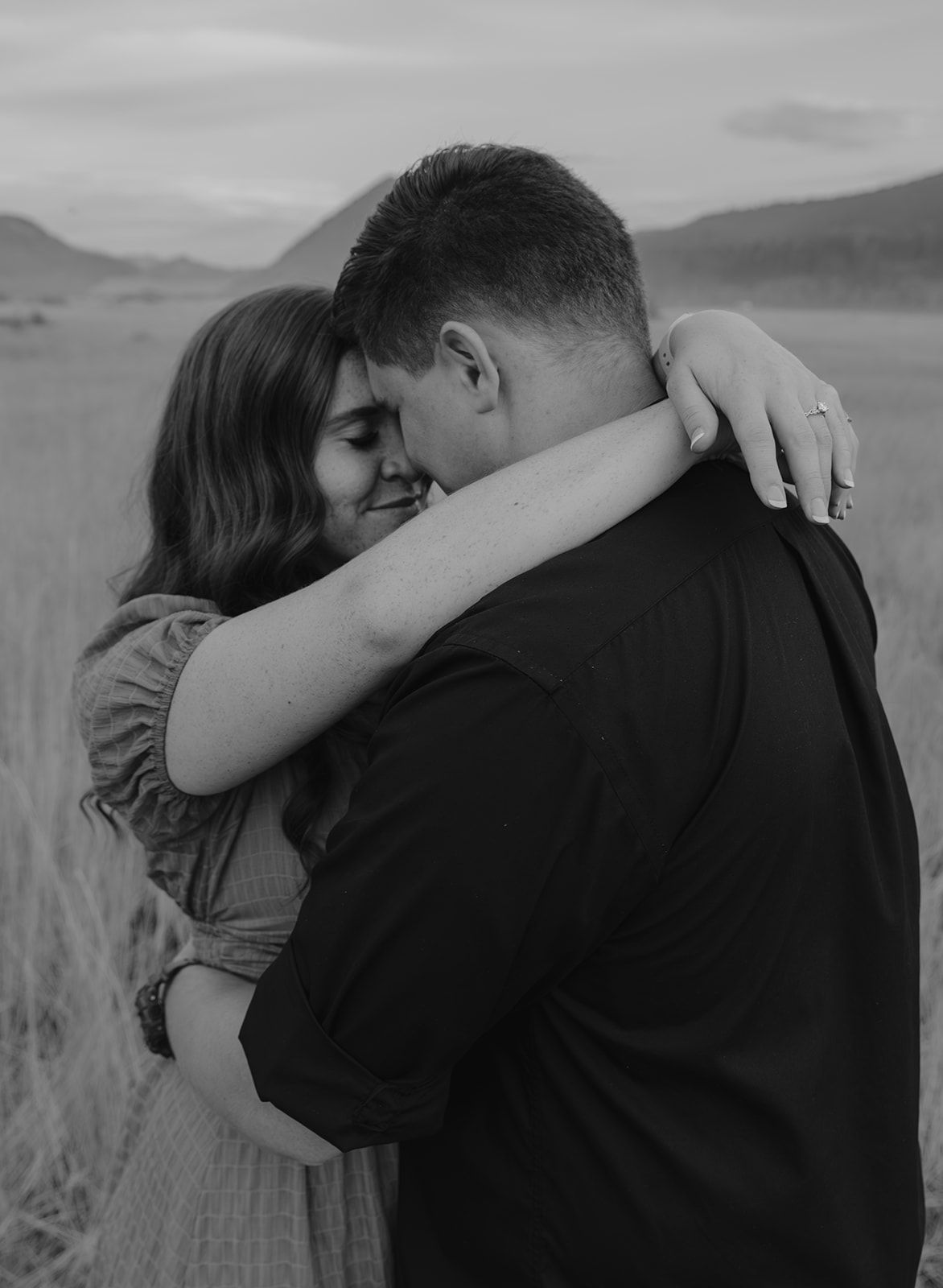 Couples engagement session near Palisades Reservoir in Idaho during August. Black and White image during engagement session