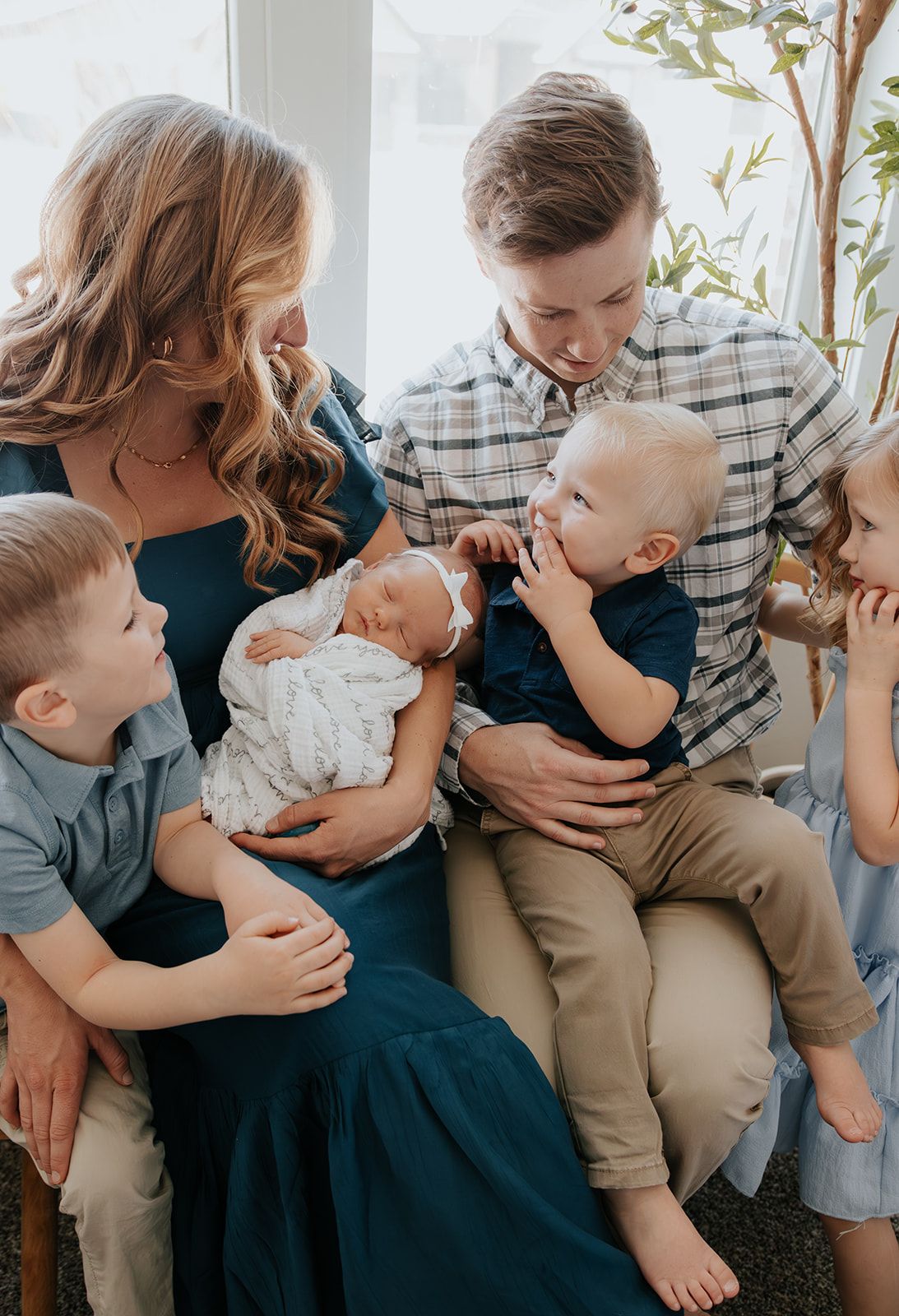 In-home newborn photoshoot in Springfield, Missouri. Intimate and candid newborn photoshoot. Family with newborn baby