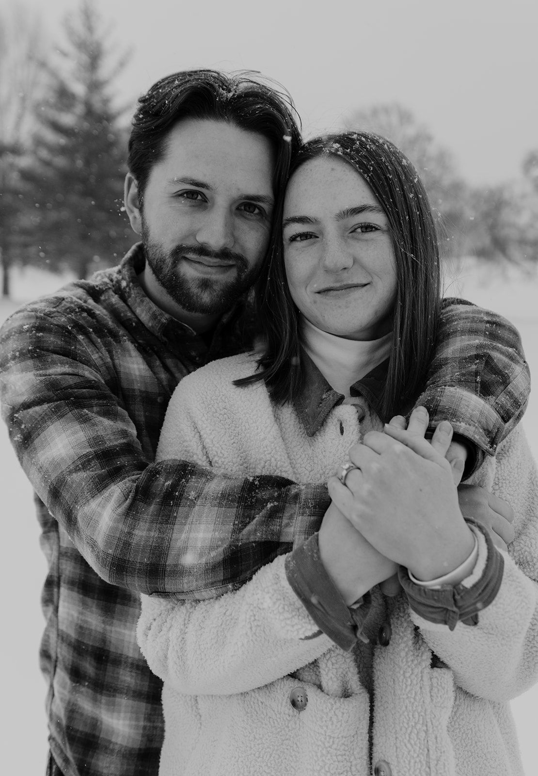 Snowy photoshoot of couple in republic, Missouri, black and white engagement photo