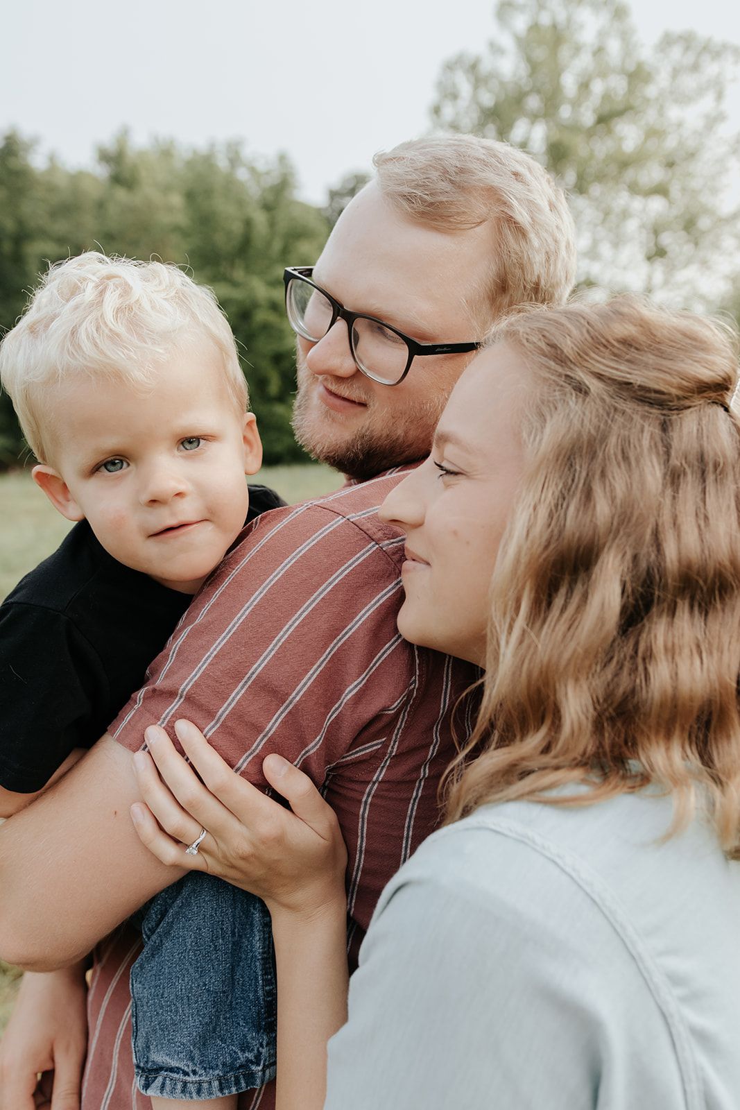 Candid small family photo at Lost Hill Park in Springfield, Missouri