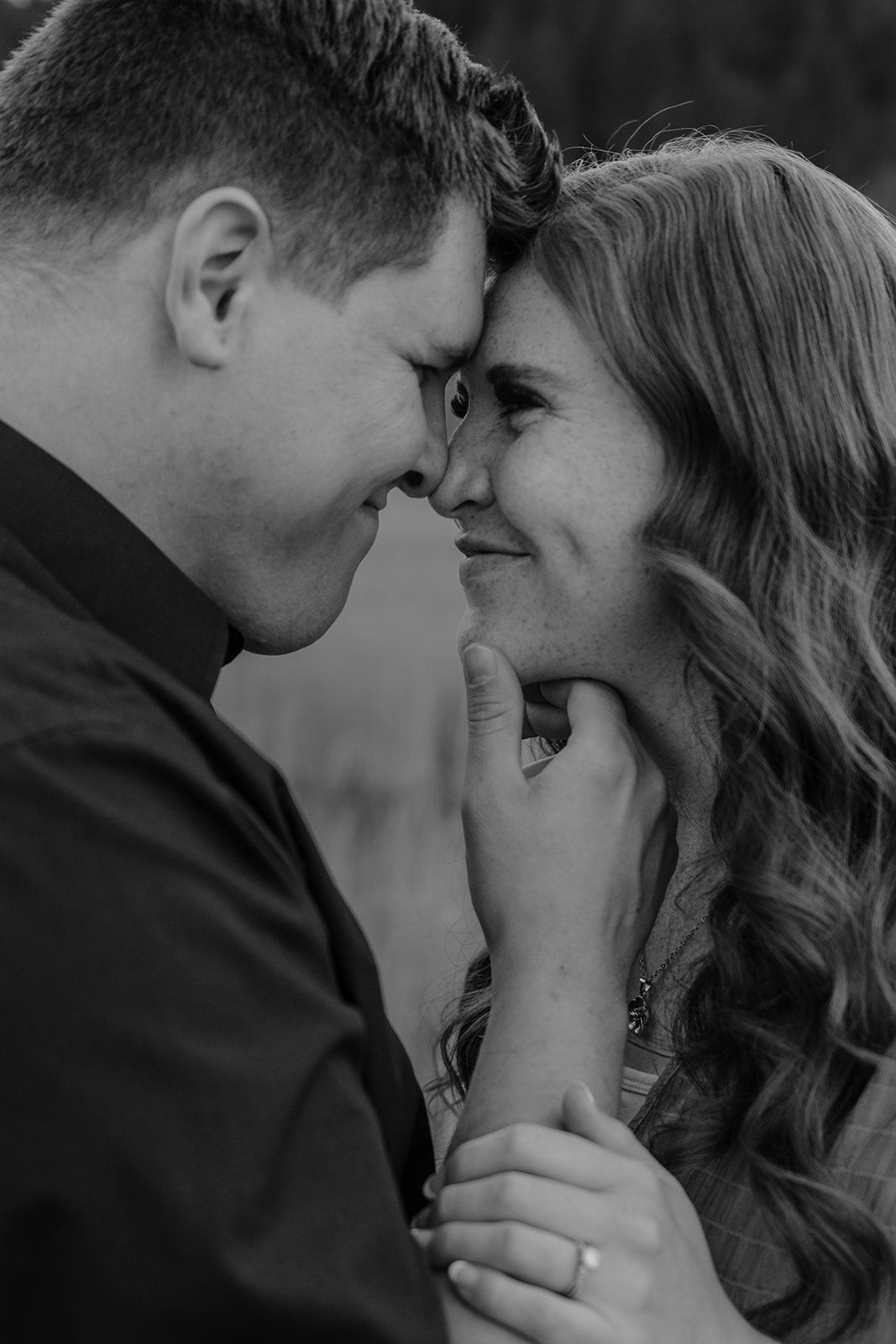 Black and white intimate photo of couple during engagement photoshoot in Swan Valley, Idaho