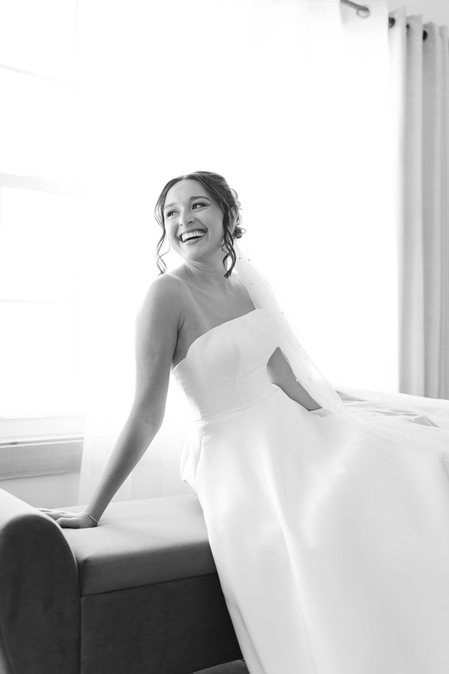 Classic Minnesota bride in clean ballgown dress getting ready photos