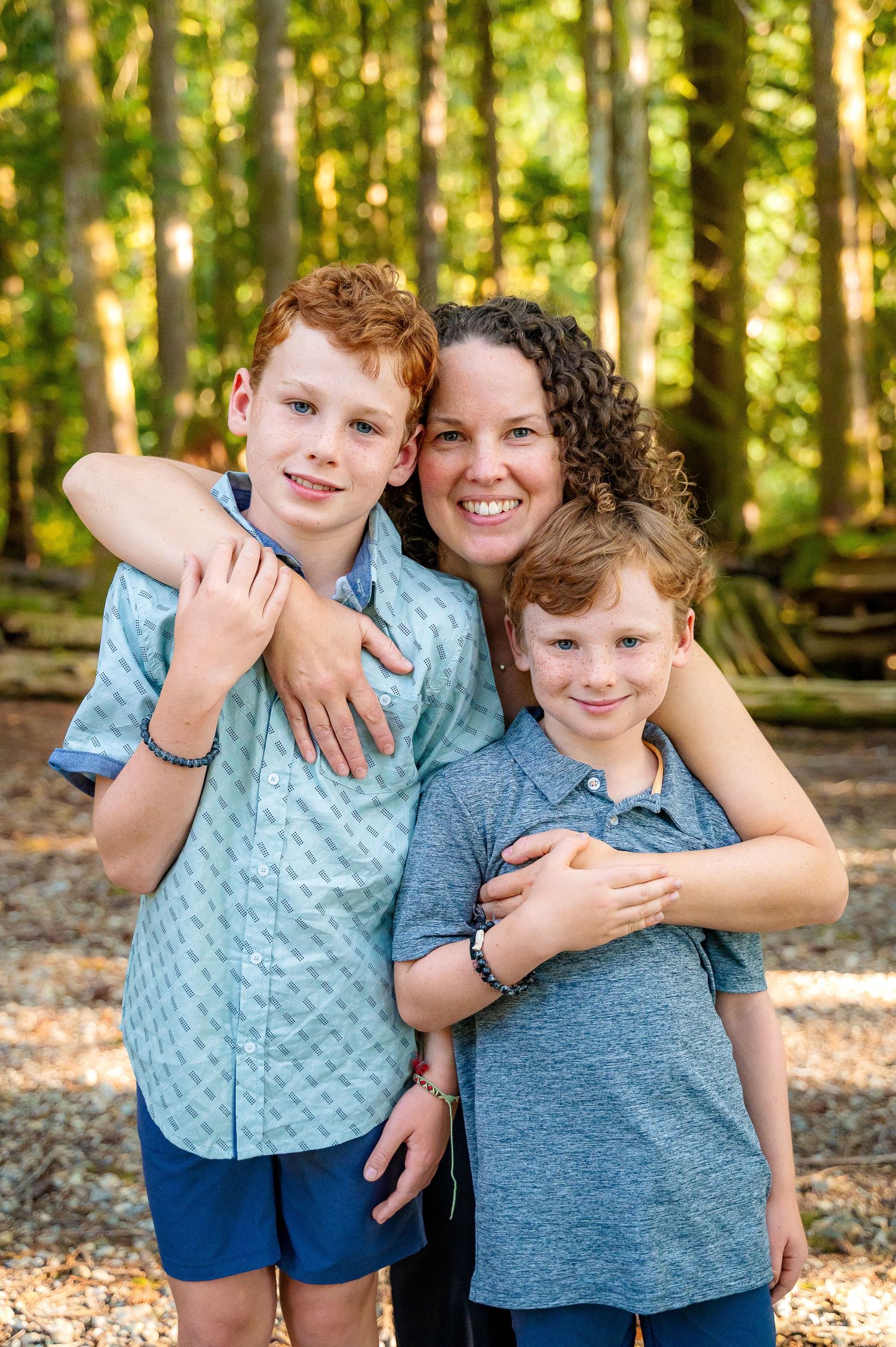 Mother and sons at spring beach