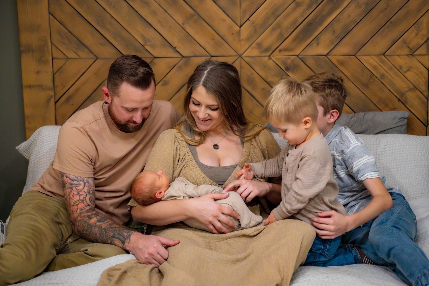 In home in bedroom newborn family