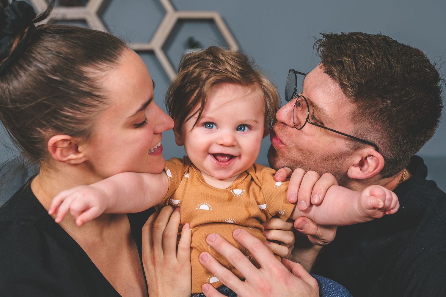 Series of candid family photos showing affectionate moments and laughter.