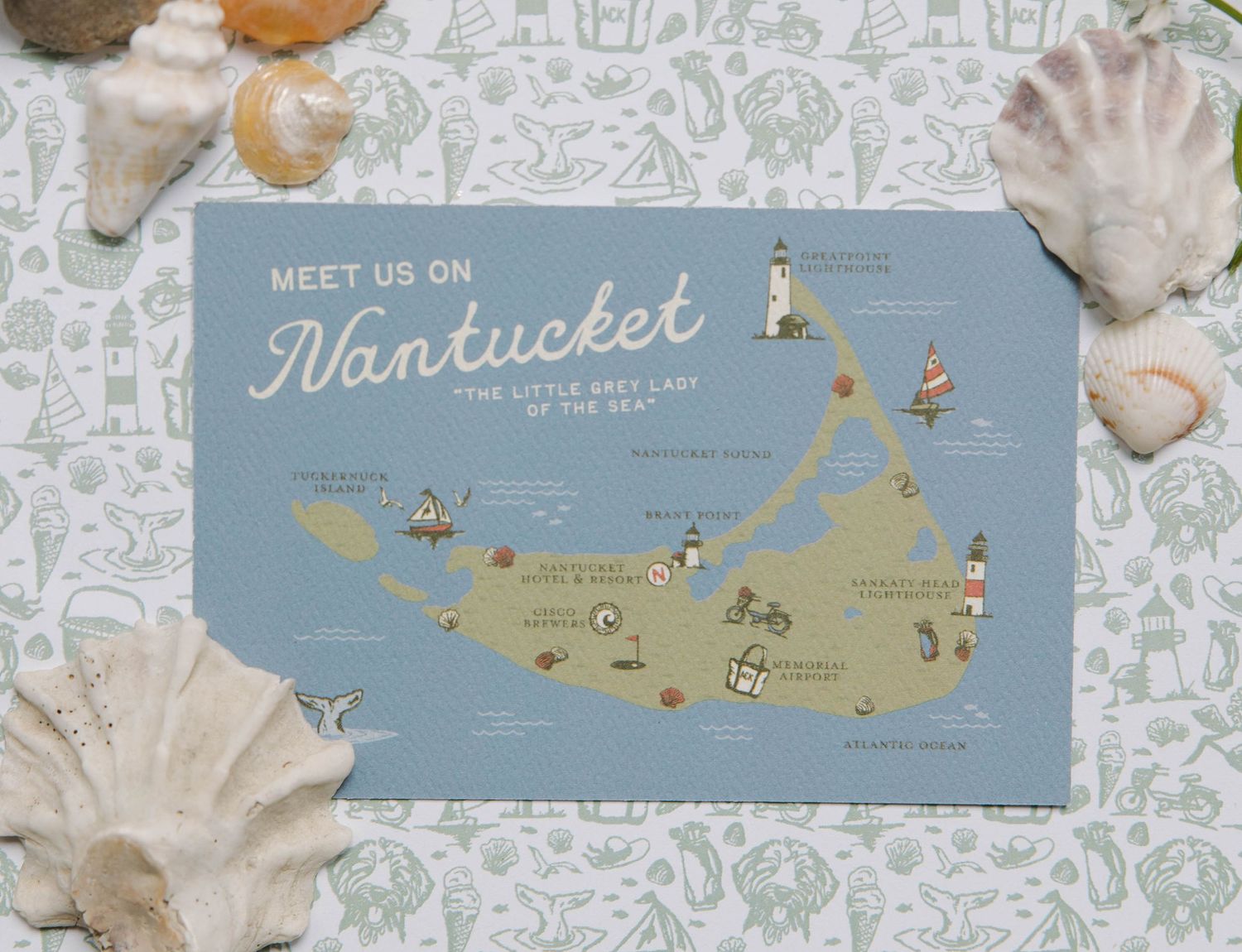 Decorative map of Nantucket island surrounded by seashells on patterned background.