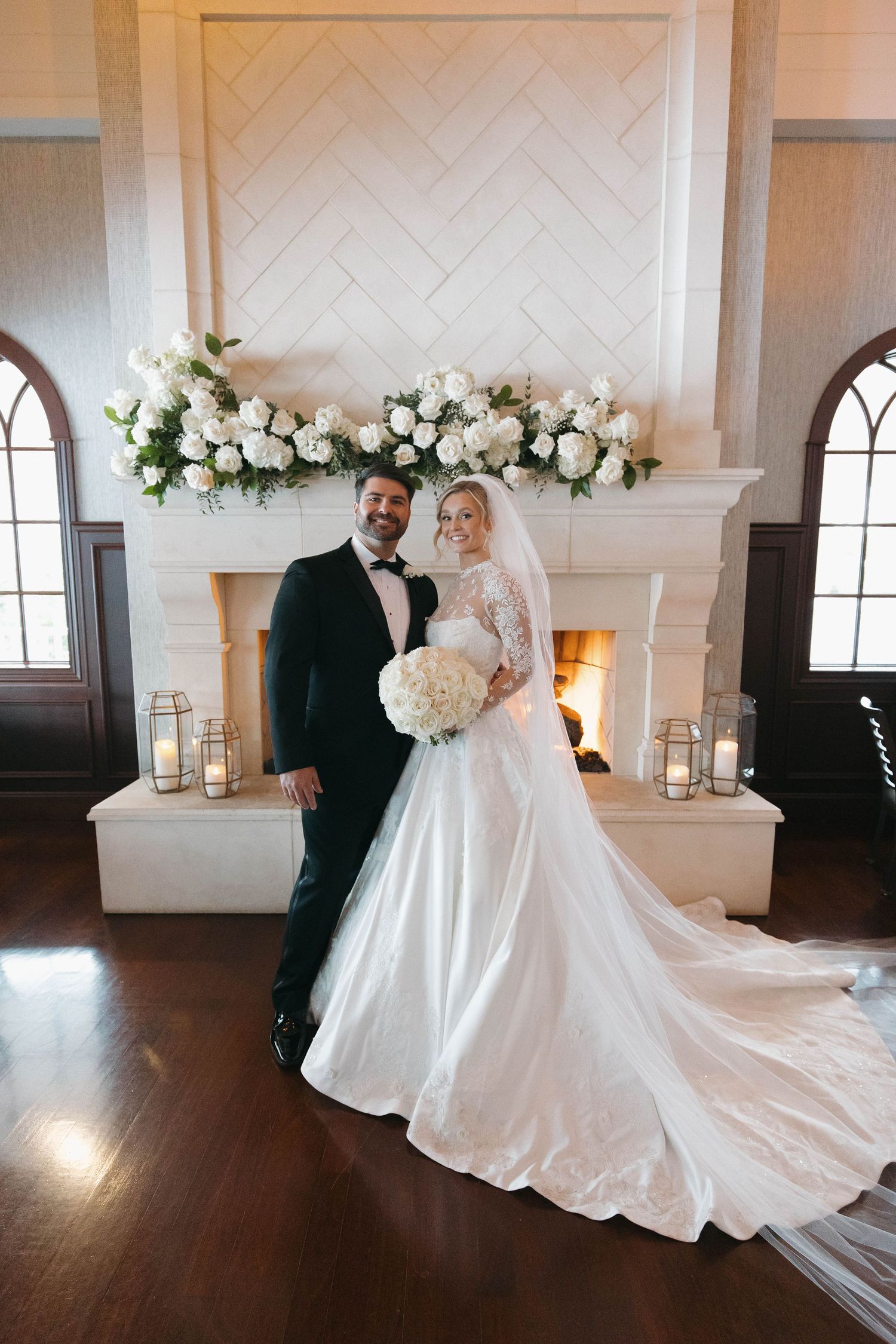 Romantic wedding photos featuring floral arrangements and elegant white decor.