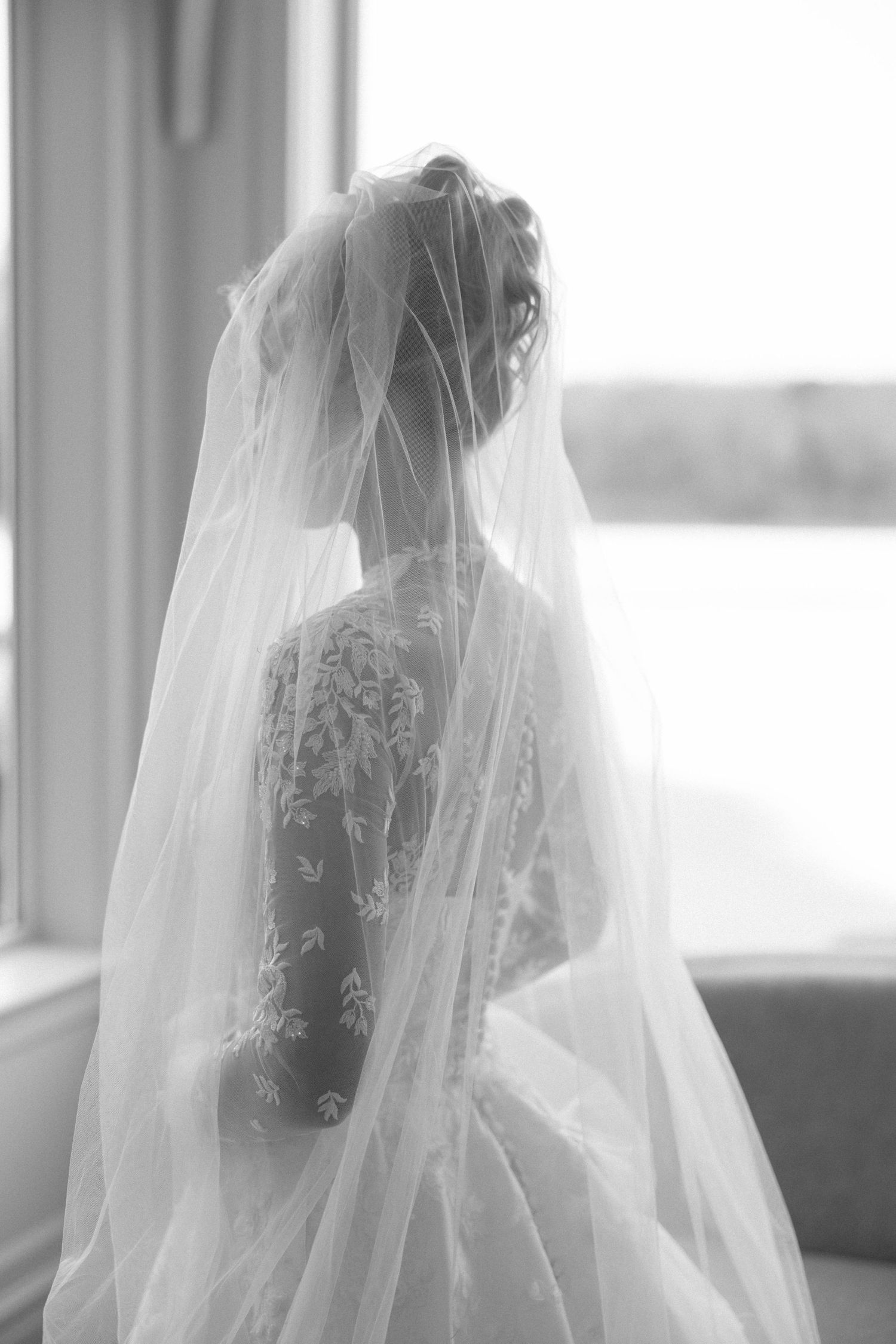 A series of ethereal bridal portraits showing a white veil against a bright window backdrop.