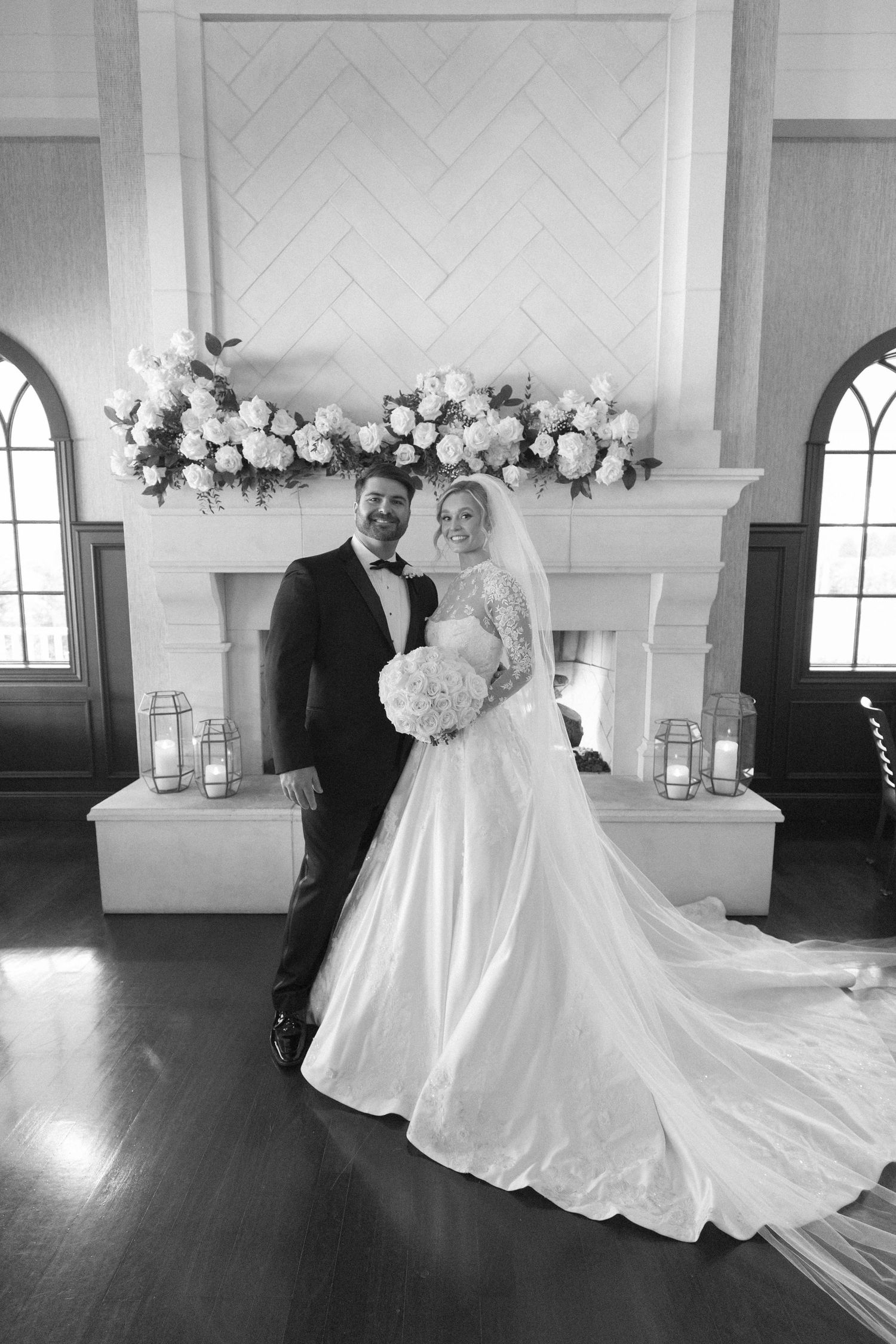Black and white wedding portraits showing tender moments between the newlyweds.