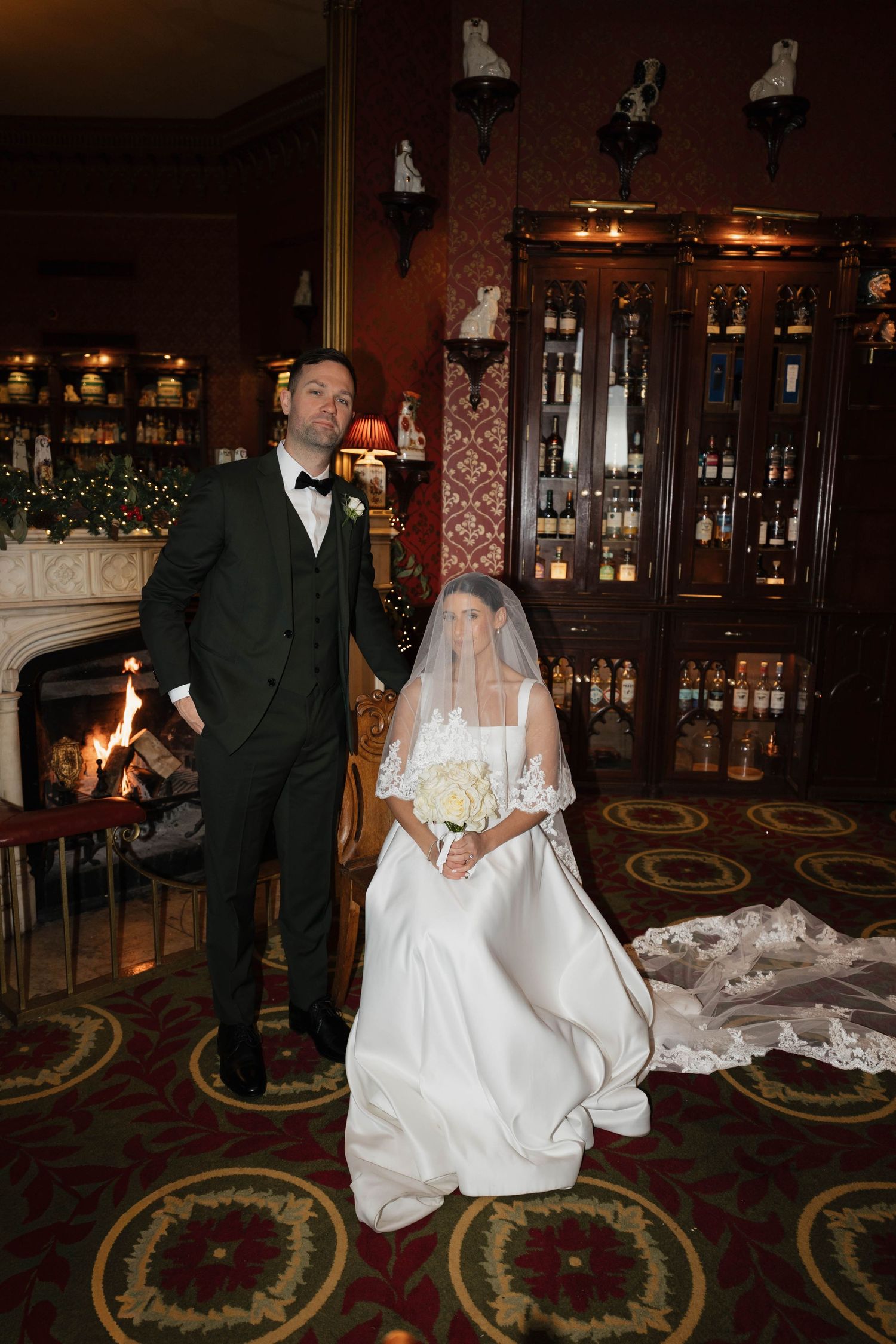 A series of romantic poses captured in a warmly lit bar area with decorative carpeting.