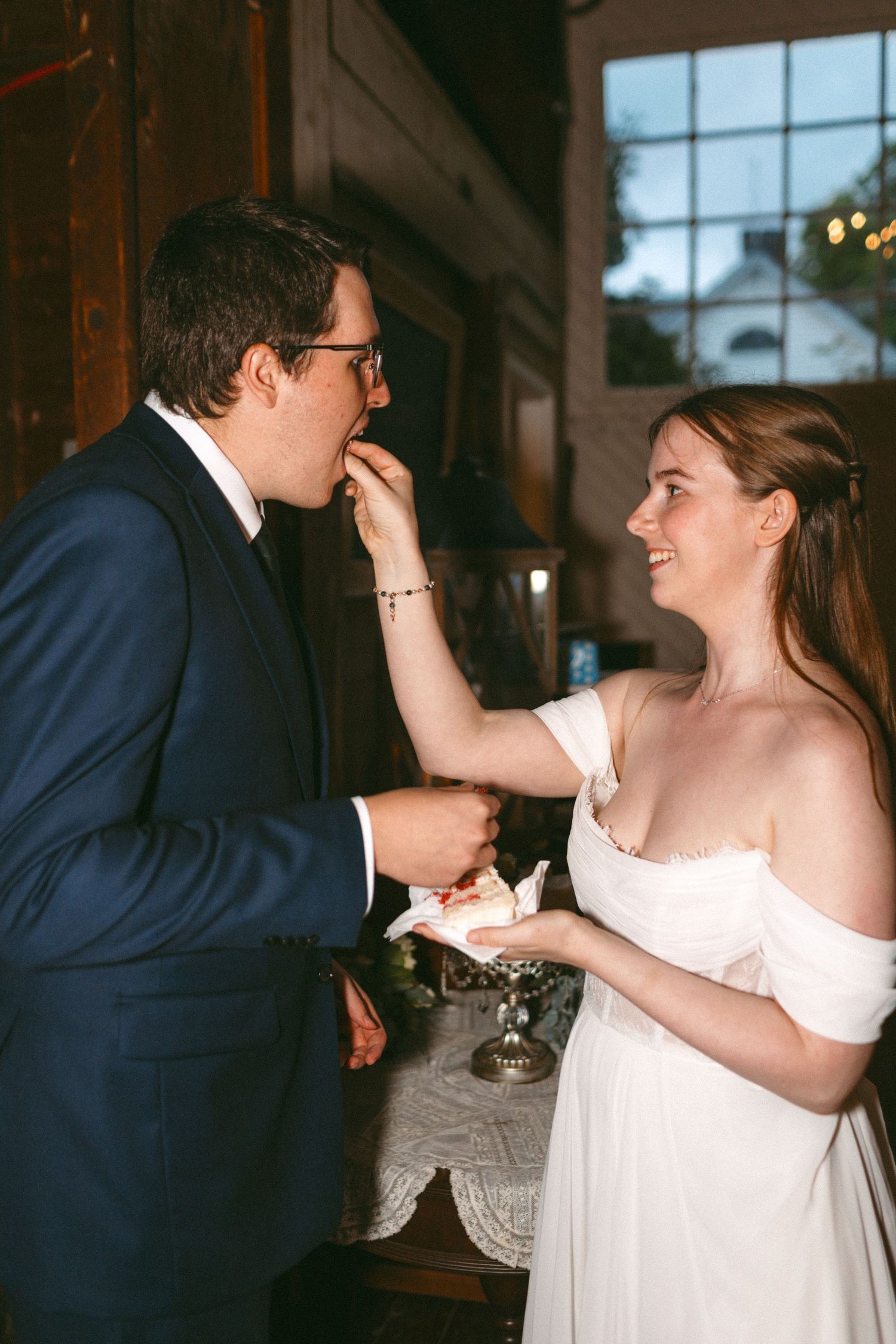 Playful wedding sequence showing couple in formal attire sharing candid moments indoors.