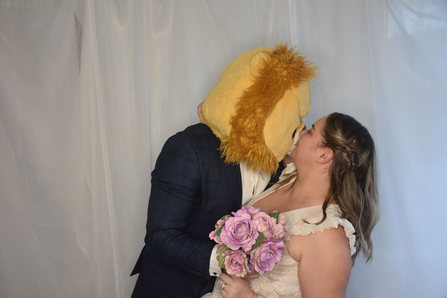 Photo booth fun by Stay&cee Creative, providing a unique and interactive way to celebrate your special day with personalized photo prints.