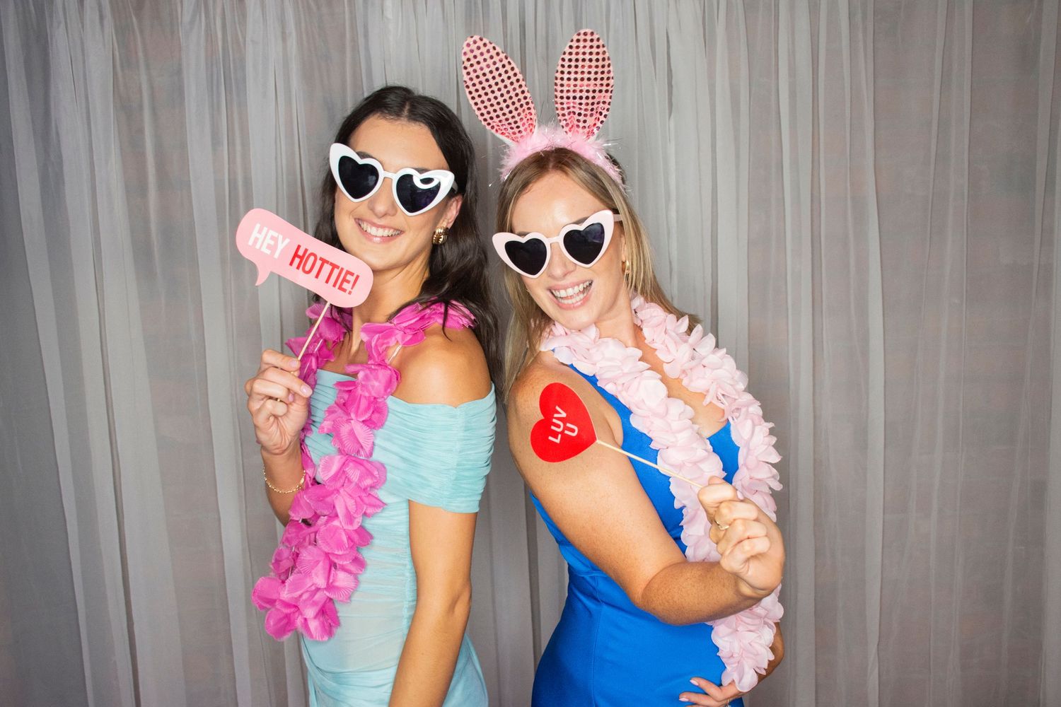 Photo booth fun by Stay&cee Creative, providing a unique and interactive way to celebrate your special day with personalized photo prints.