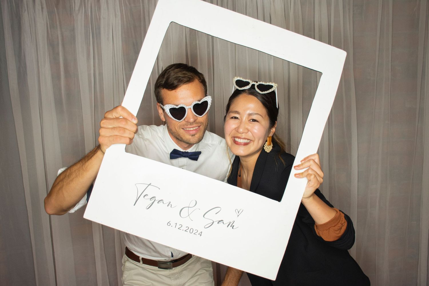 Photo booth fun by Stay&cee Creative, providing a unique and interactive way to celebrate your special day with personalized photo prints.