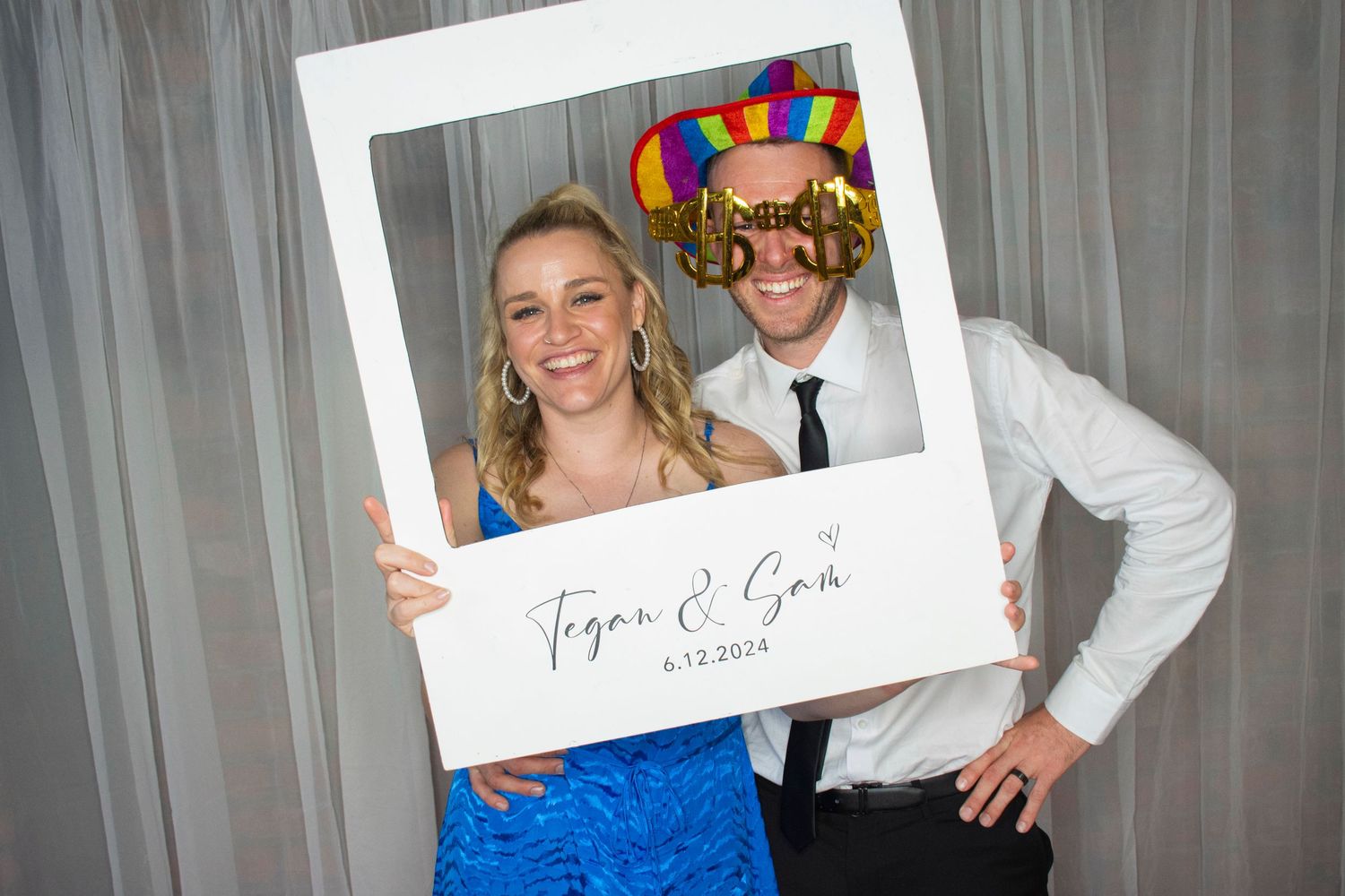 Photo booth fun by Stay&cee Creative, providing a unique and interactive way to celebrate your special day with personalized photo prints.