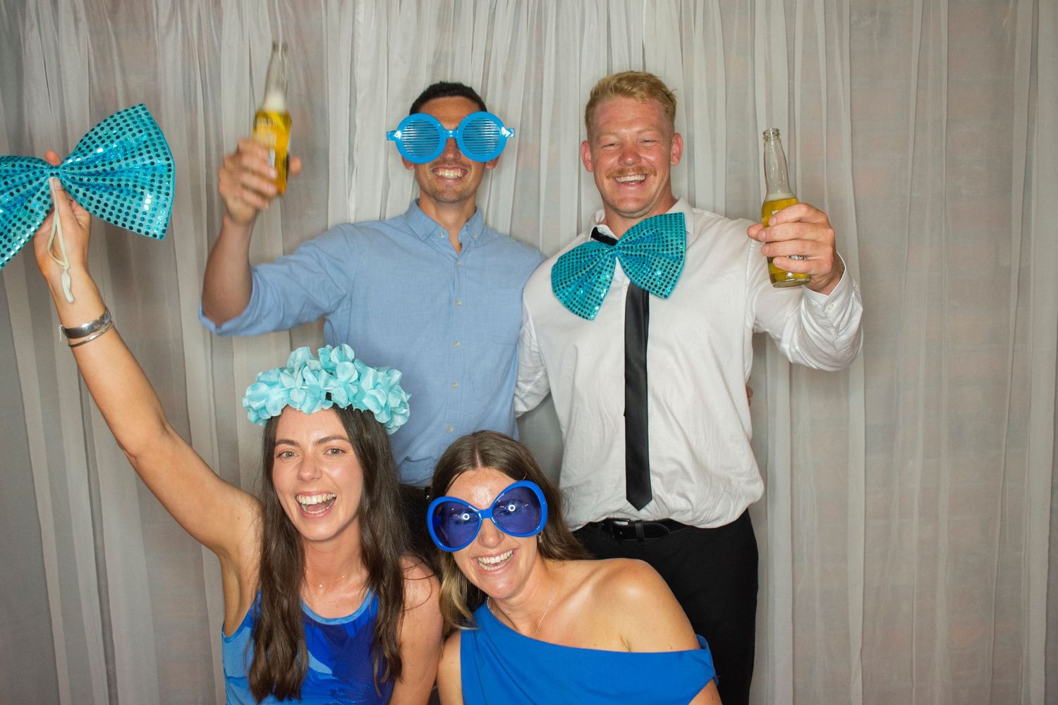 Photo booth fun by Stay&cee Creative, providing a unique and interactive way to celebrate your special day with personalized photo prints.