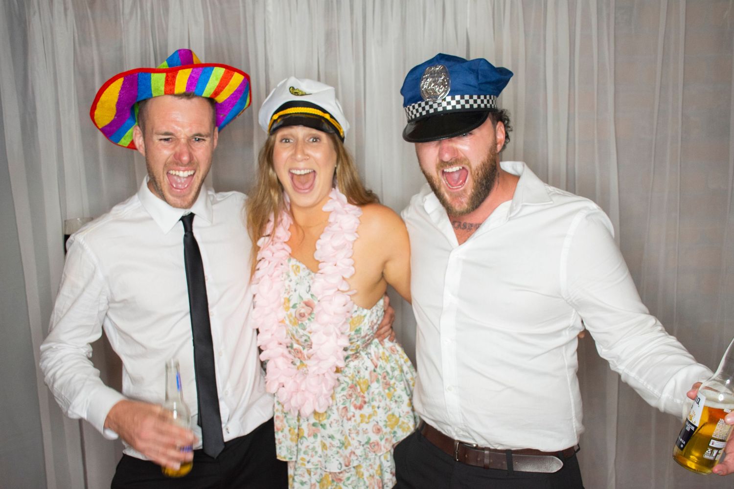 Photo booth fun by Stay&cee Creative, providing a unique and interactive way to celebrate your special day with personalized photo prints.