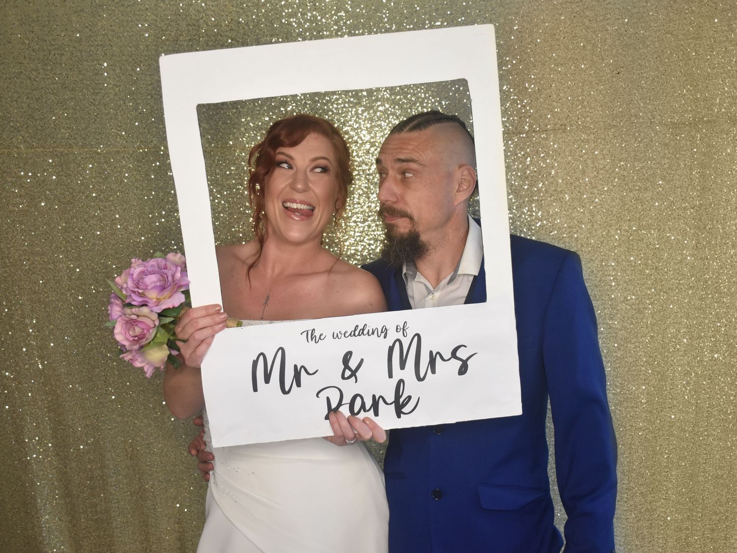 Photo booth fun by Stay&cee Creative, providing a unique and interactive way to celebrate your special day with personalized photo prints.