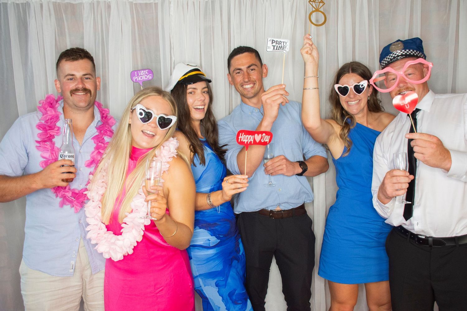 Photo booth fun by Stay&cee Creative, providing a unique and interactive way to celebrate your special day with personalized photo prints.