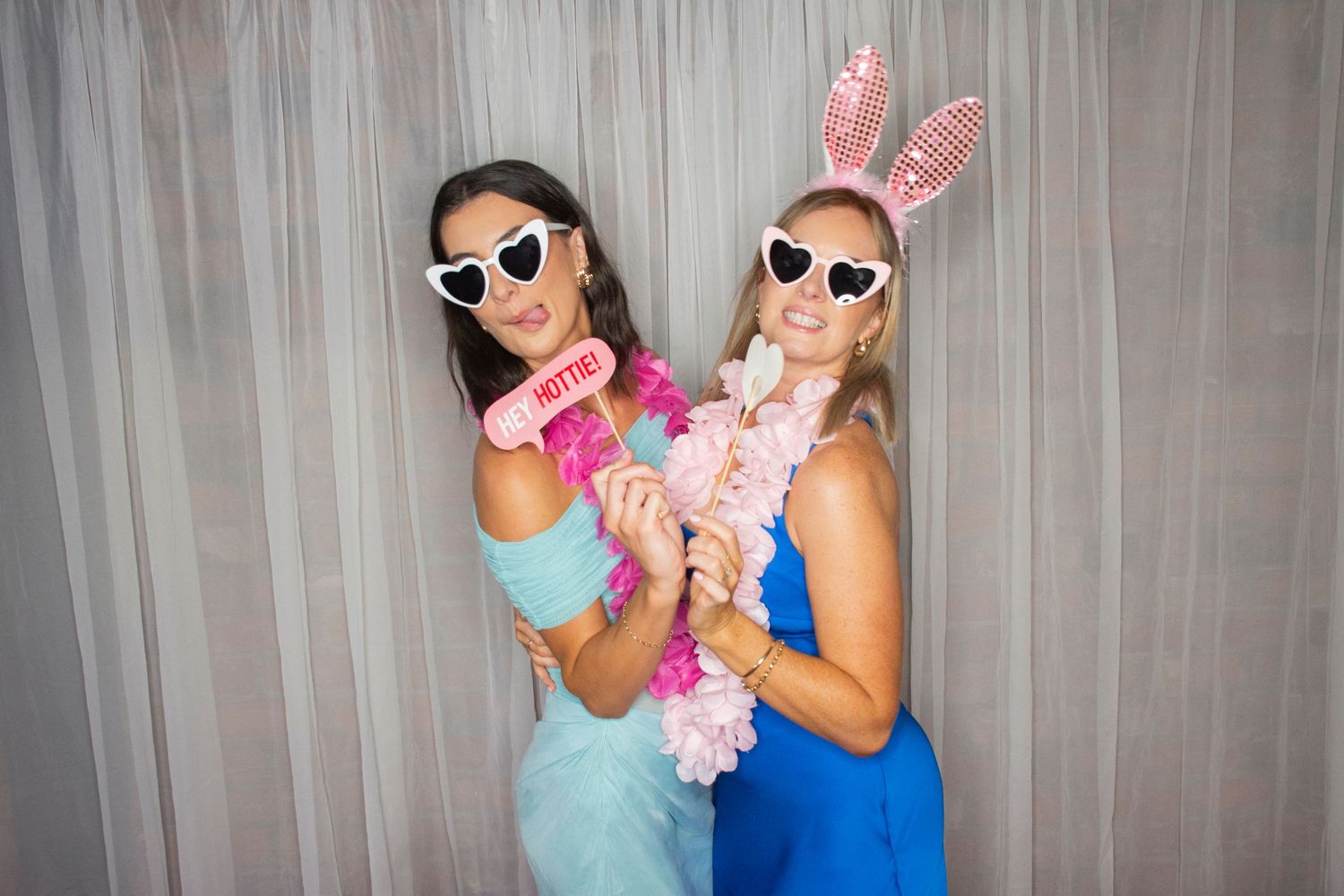 Photo booth fun by Stay&cee Creative, providing a unique and interactive way to celebrate your special day with personalized photo prints.