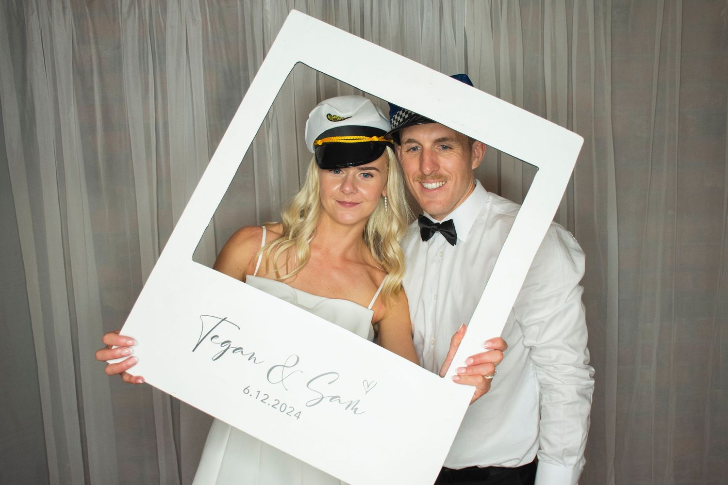 Photo booth fun by Stay&cee Creative, providing a unique and interactive way to celebrate your special day with personalized photo prints.