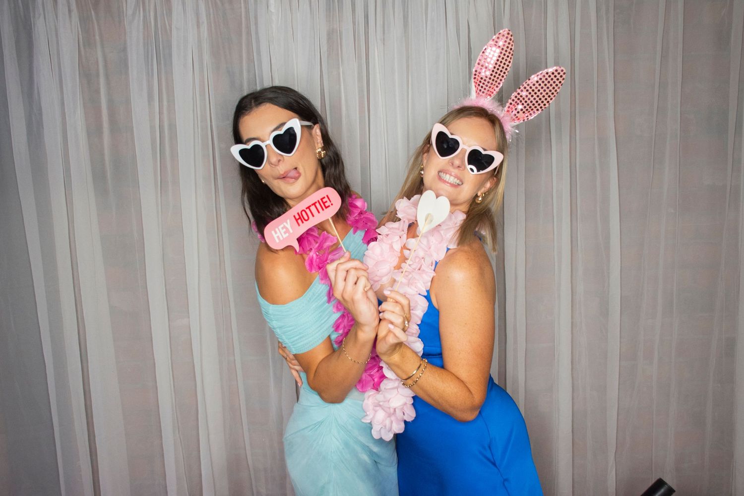 Photo booth fun by Stay&cee Creative, providing a unique and interactive way to celebrate your special day with personalized photo prints.