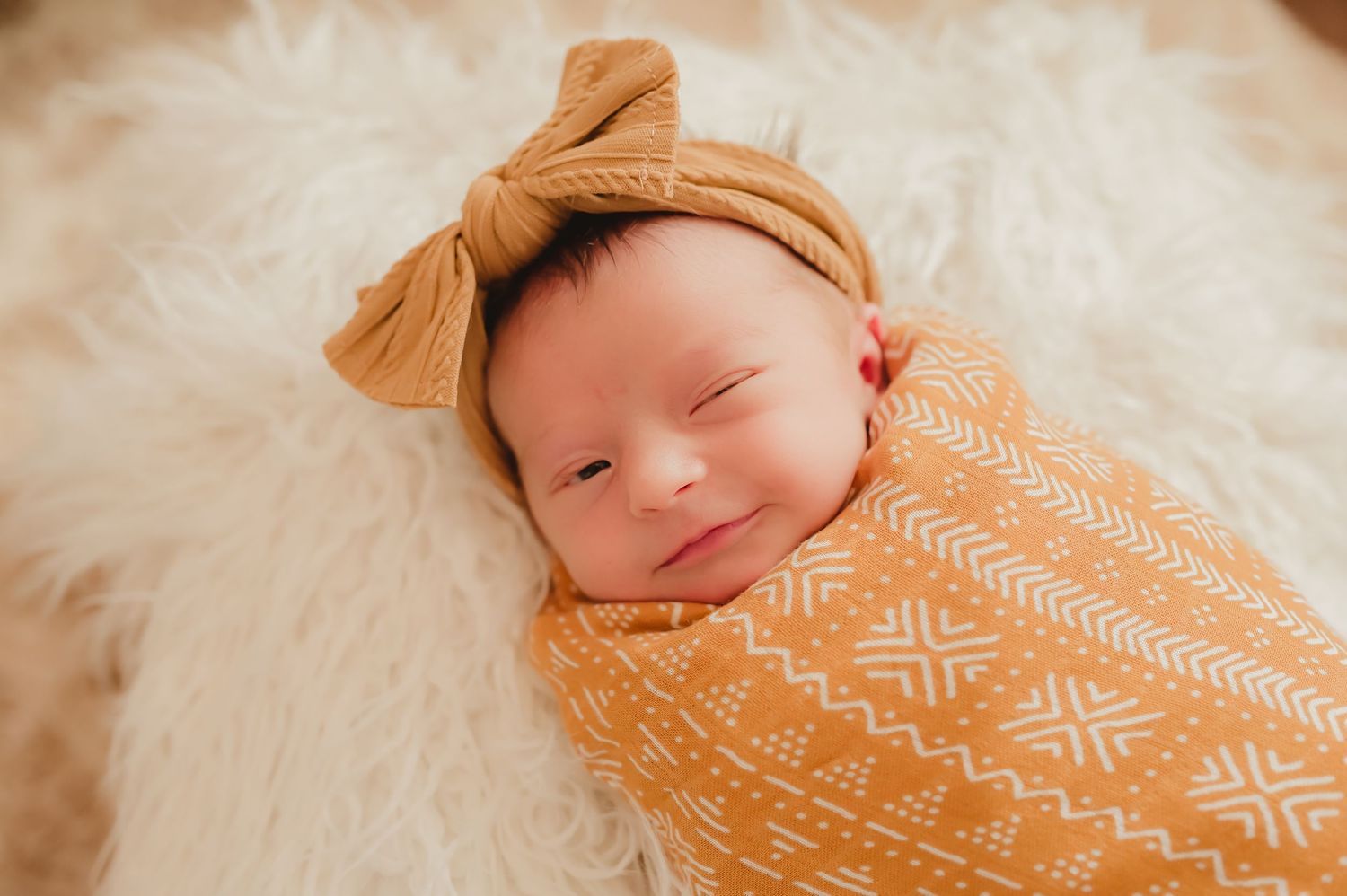 Baby grins